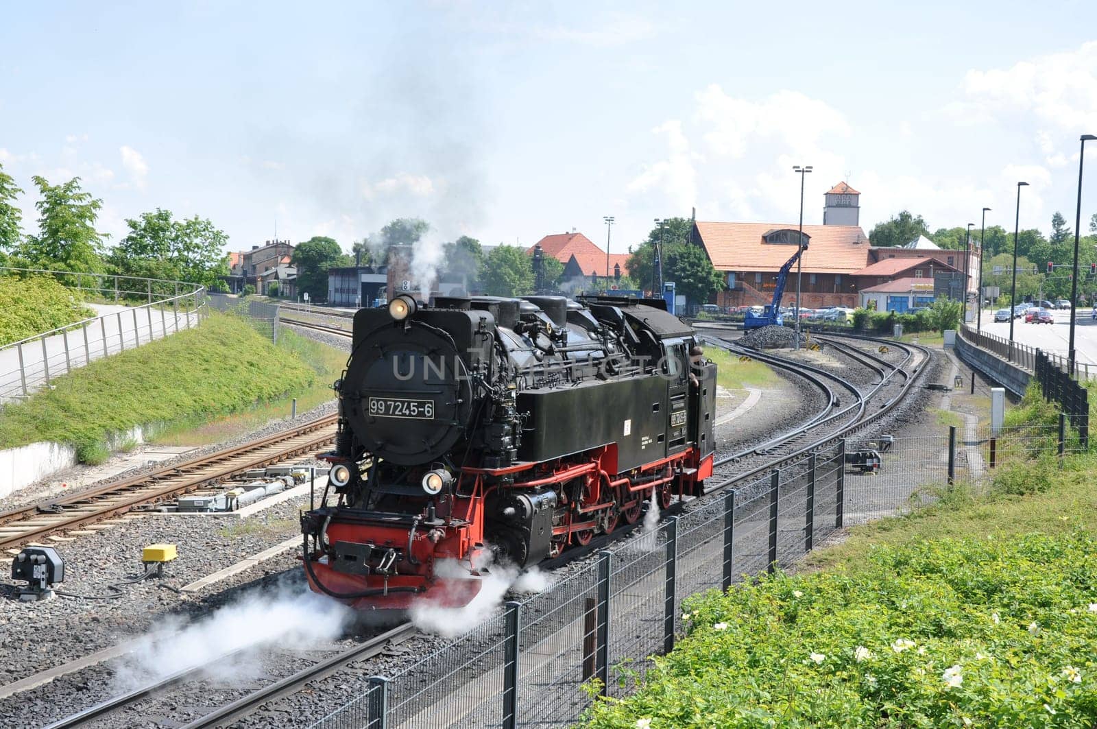 Scenic shot of the Harz Narrow Gauge Railways steam locomotive at the Wernigerode station in Germany