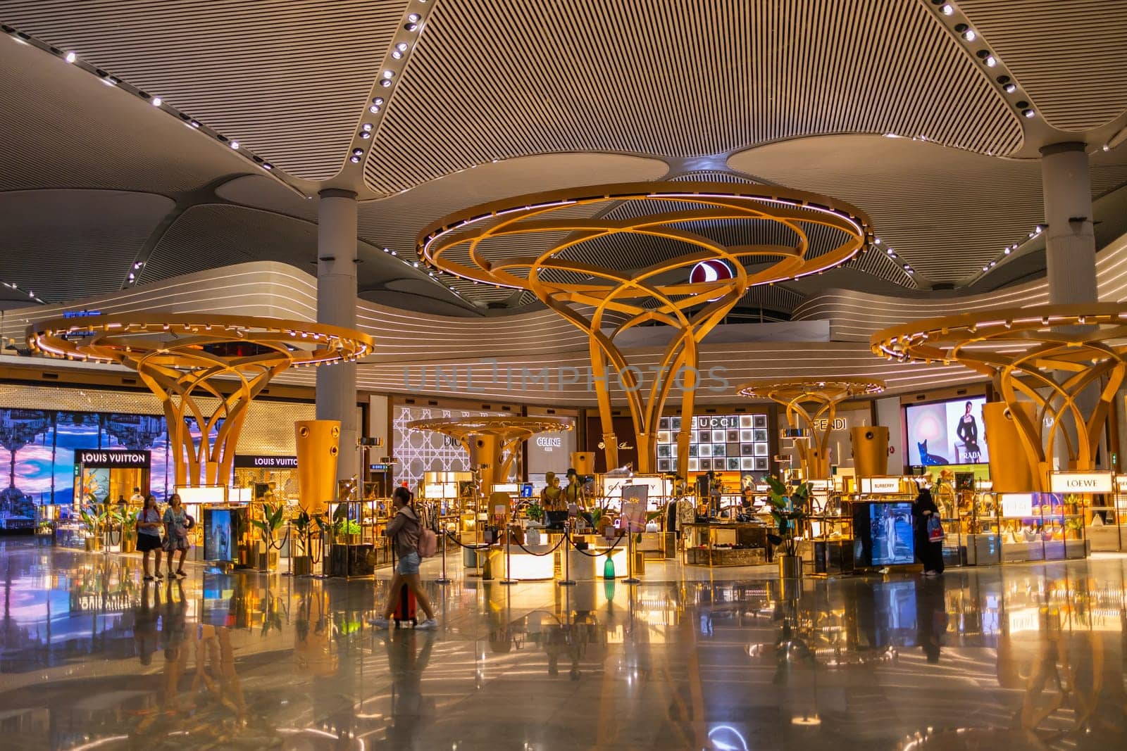 ISTANBUL, TURKEY - August 09, 2022: A view of duty free shops and stores at the international departure terminal of New International Istanbul Airport