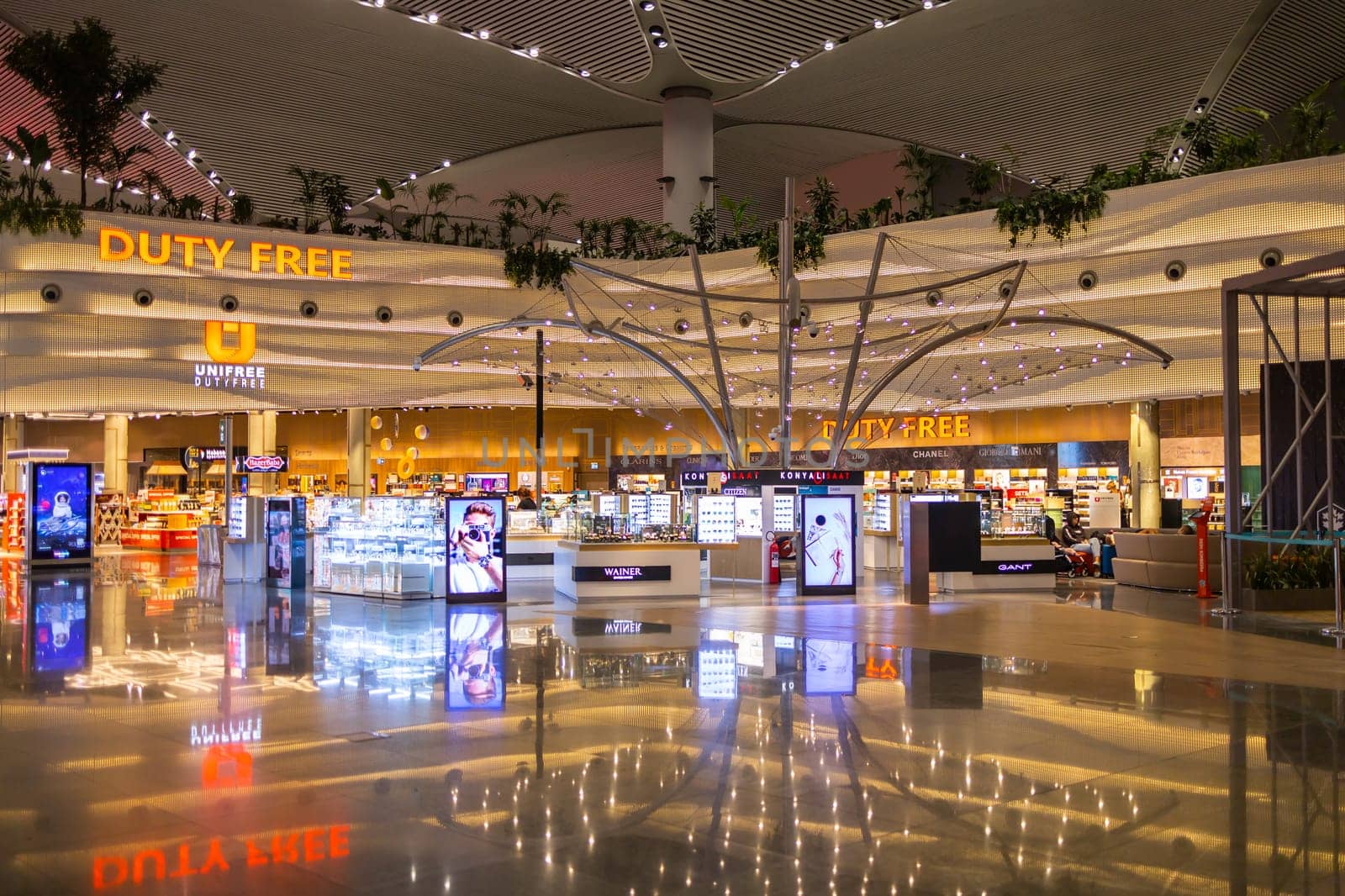 ISTANBUL, TURKEY - August 09, 2022: A view of duty free shops and stores at the international departure terminal of New International Istanbul Airport