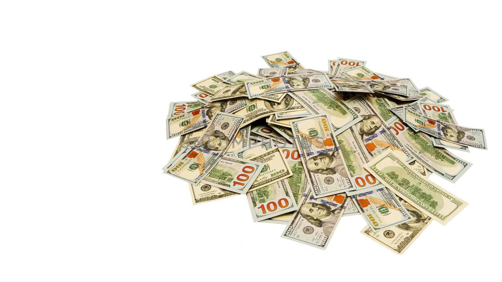 Large pile of one hundred dollar bills on a white isolated background.