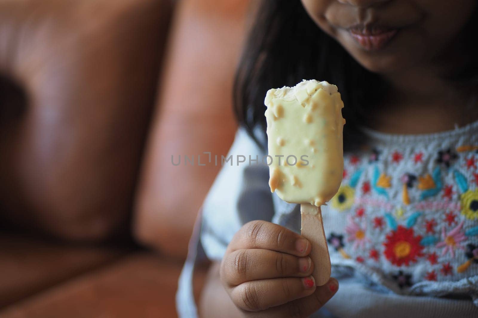 Child Hand Holding Ice Cream by towfiq007