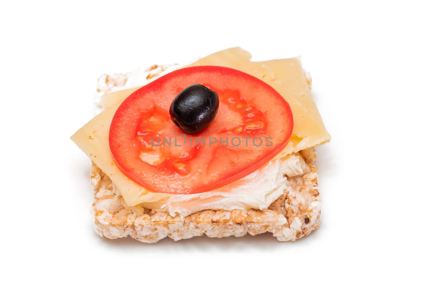 Rice Cake Sandwich with Tomato, Cheese and Olives - Isolated on White. Easy Breakfast. Diet Food. Quick and Healthy Sandwiches. Crispbread with Tasty Filling. Healthy Dietary Snack - Isolation