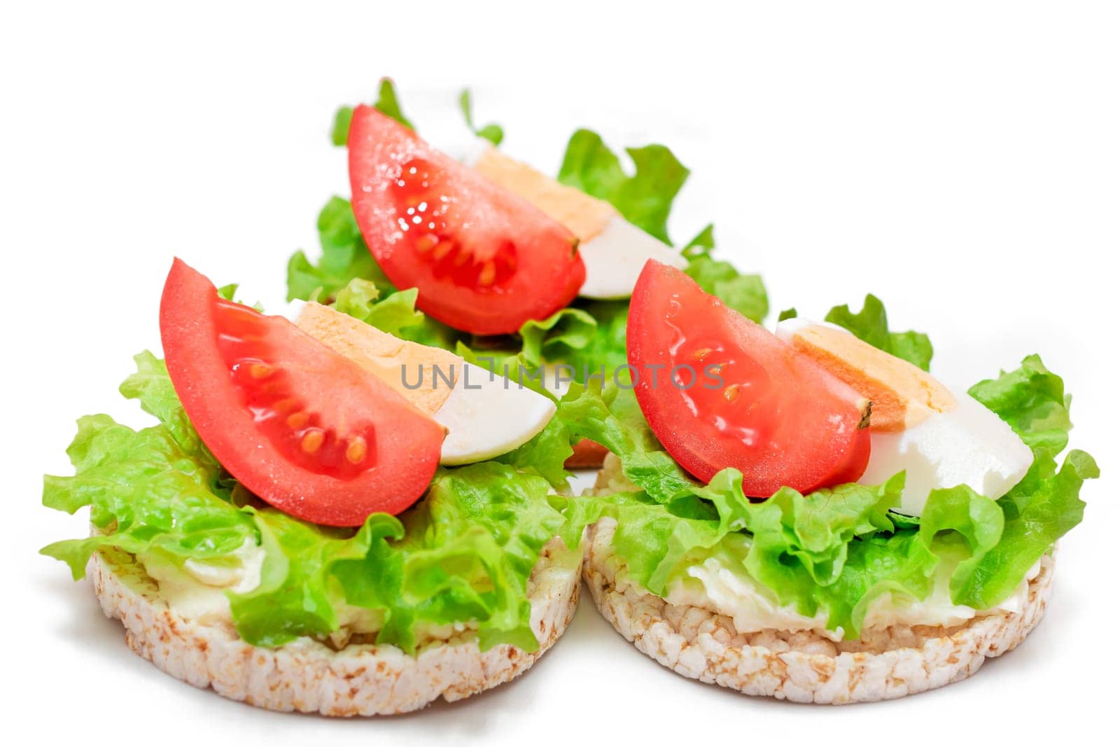 Rice Cake Sandwiches with Tomato, Lettuce and Egg - Isolated by InfinitumProdux