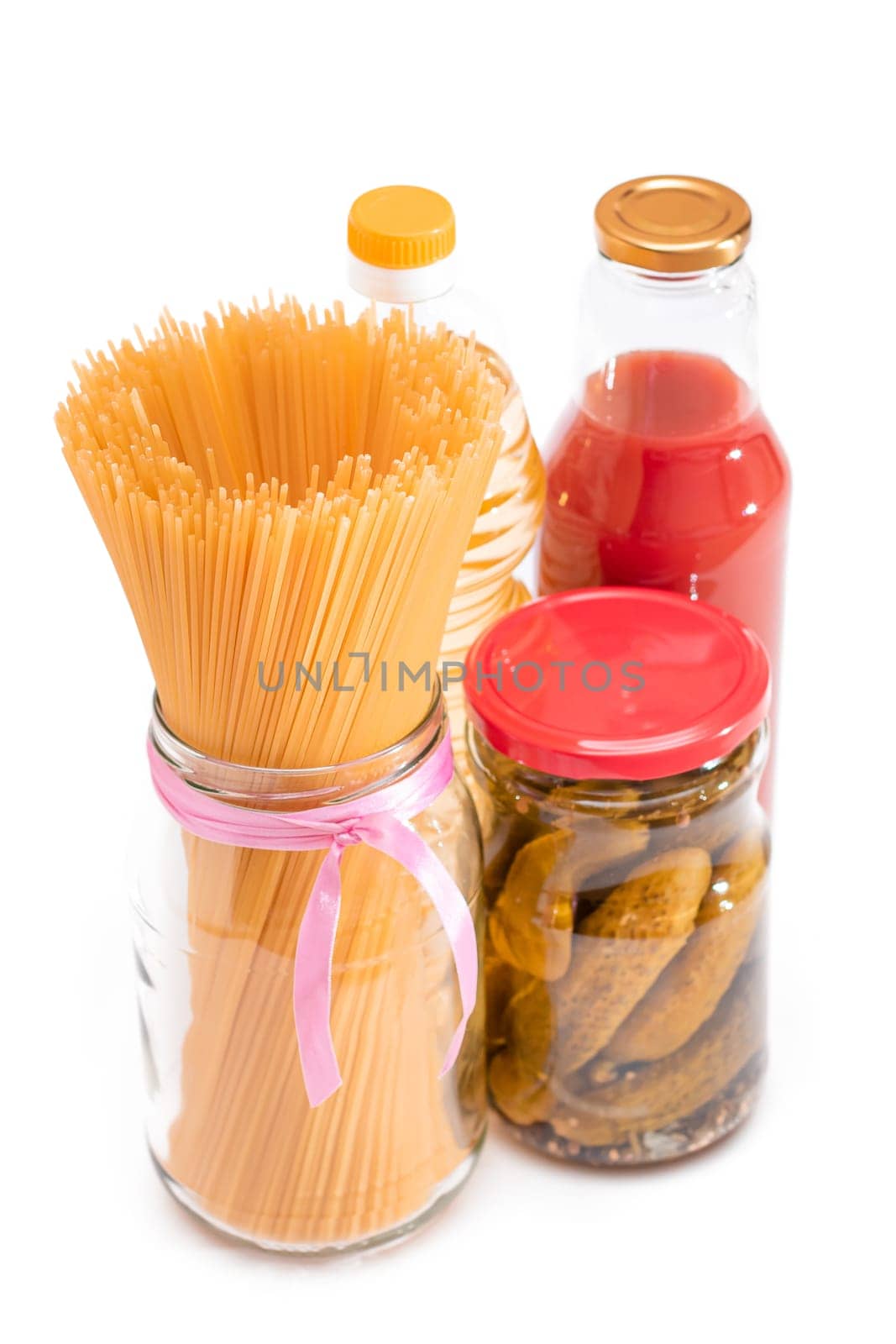 Food Reserves: Canned Food, Spaghetti, Pickles and Tomato Juice - Isolated on White Background by InfinitumProdux