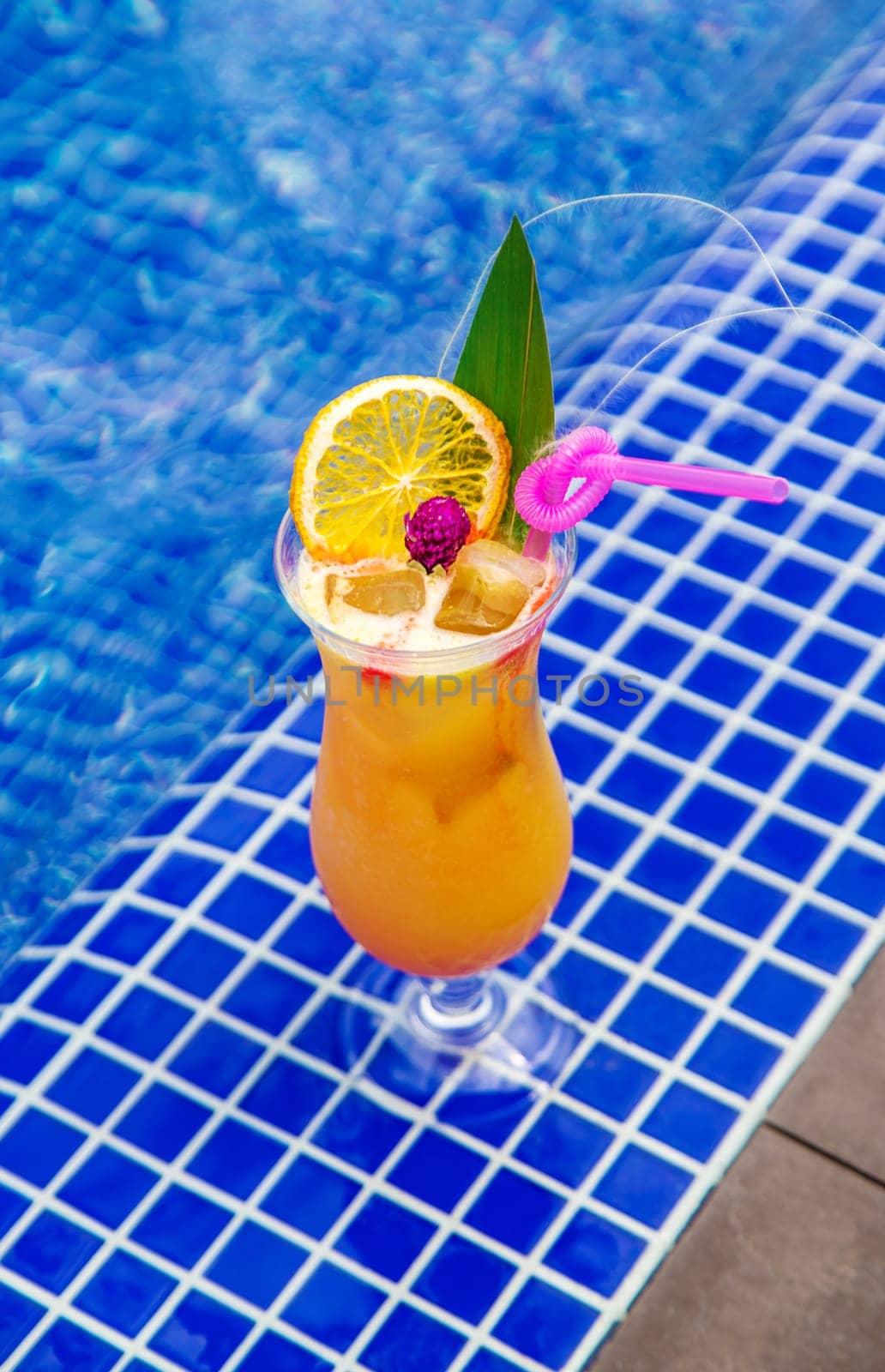 Beautiful cocktail by the pool. Selective focus. Drinks.