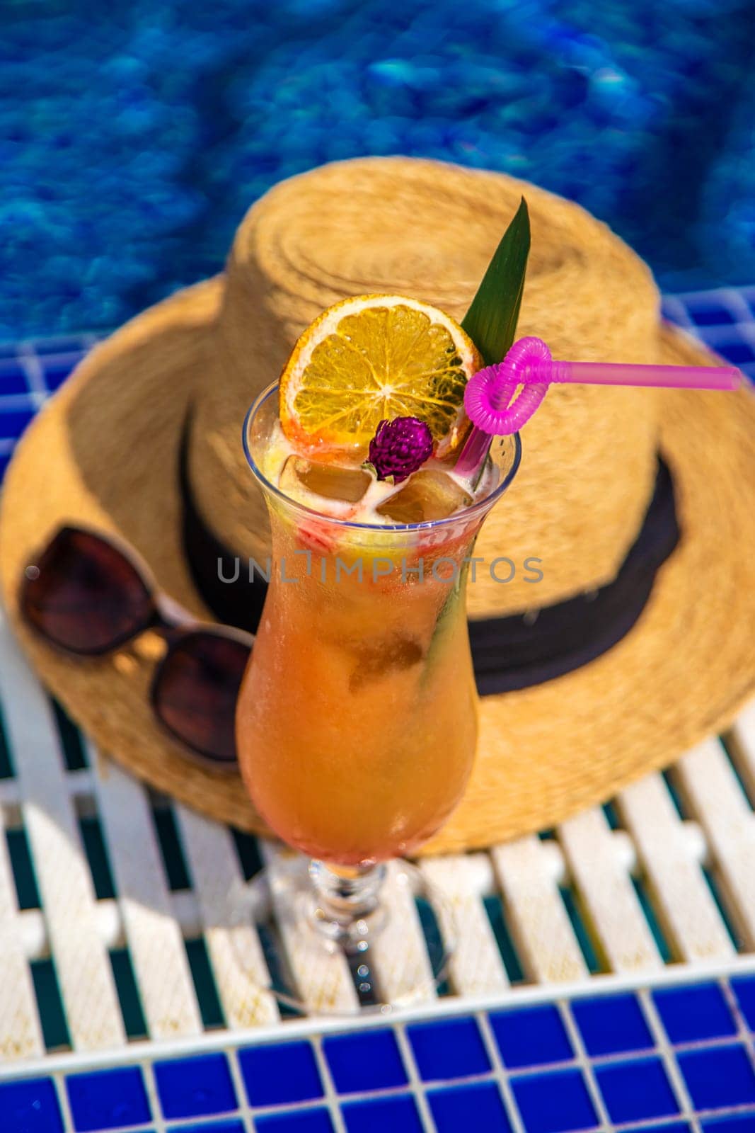 Beautiful cocktail by the pool. Selective focus. Drinks.