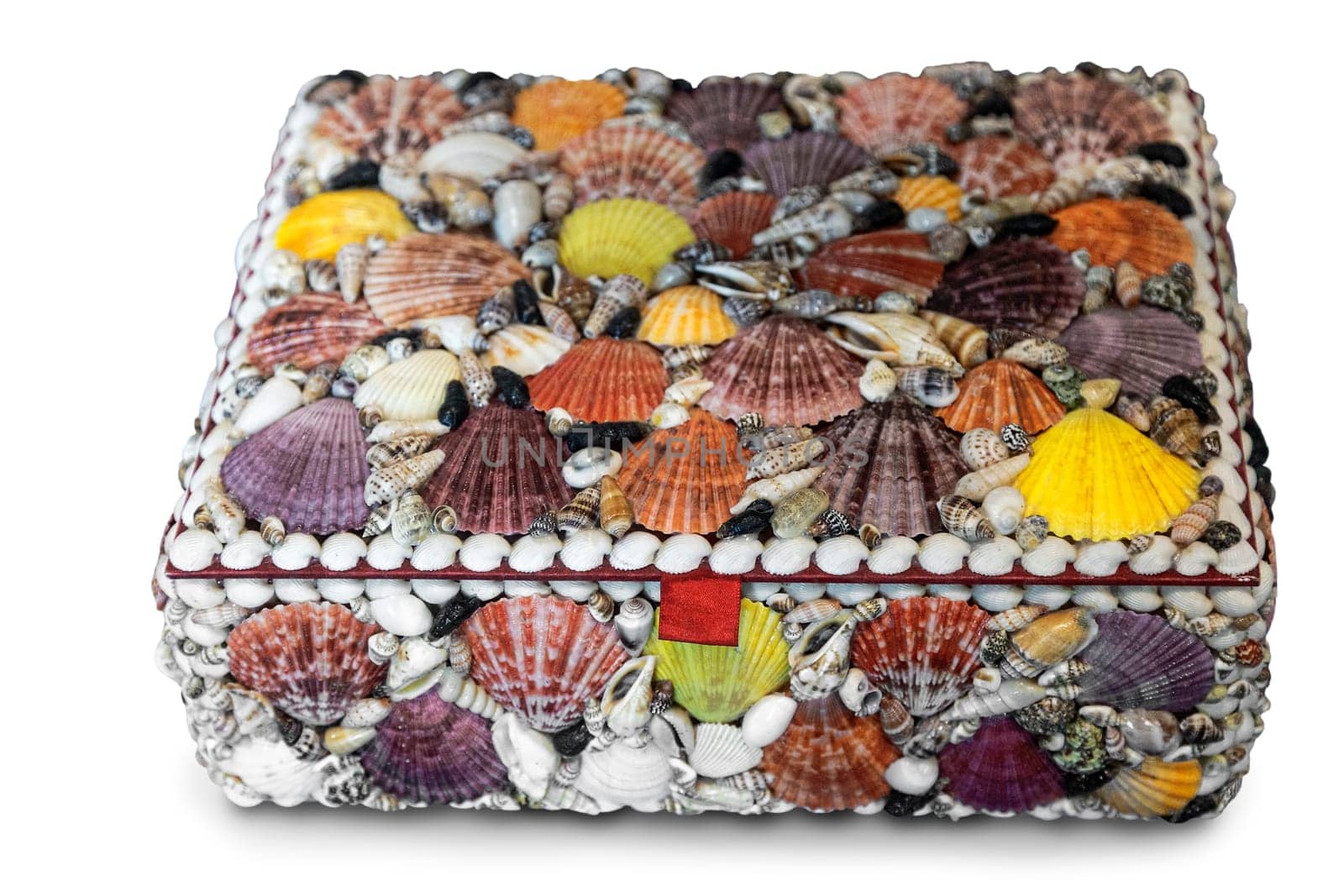 Beautiful decorative box decorated with sea shells of different colors. Presented on a white background.