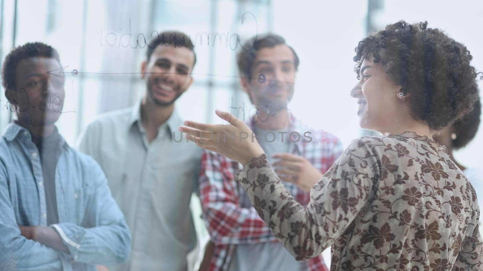 In a modern office. a diverse team of managers at a company meeting to discuss business projects.