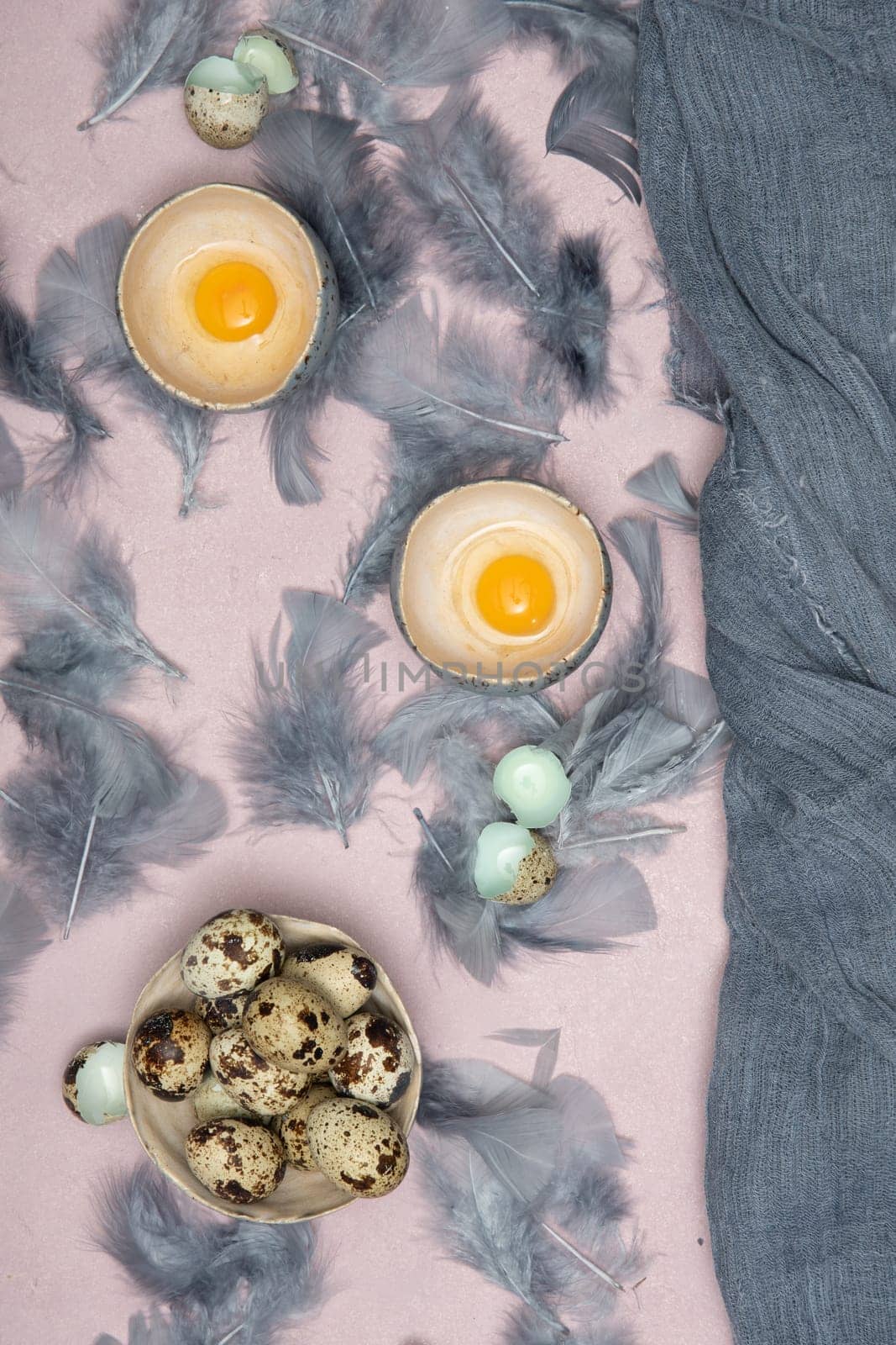 quail eggs in ceramic vases, gray feathers on the table, Easter still life with dietary eggs, diet and antioxidants, dark key and shallow depth of field, high quality photo