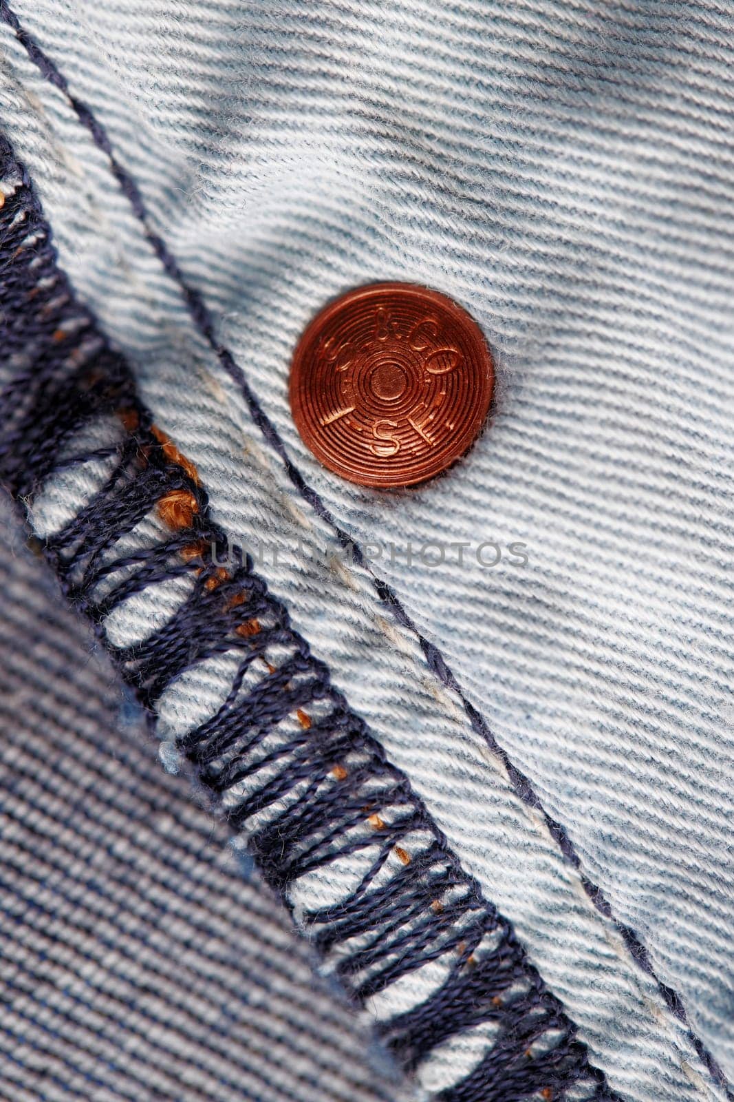 Seams on LEVI'S jeans close-up. Stitching on denim on the inside. Fabric texture. Blue jeans background and texture. Denim texture on the underside of the textile. 31.12.2021, Rostov, Russia.