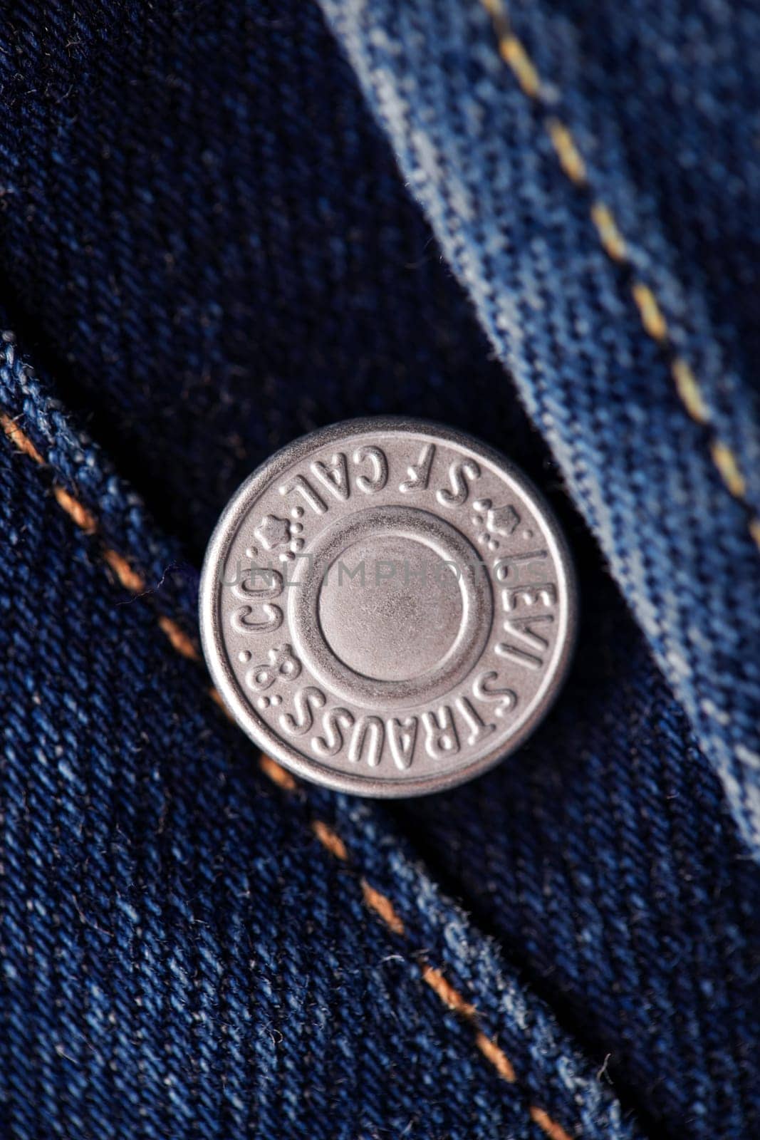 Close up of the details of new LEVI'S 501 Jeans. Seams and button fly close-up. Classic jeans model. LEVI'S is a brand name of Levi Strauss and Co, founded in 1853. 31.12.2021, Rostov, Russia by EvgeniyQW