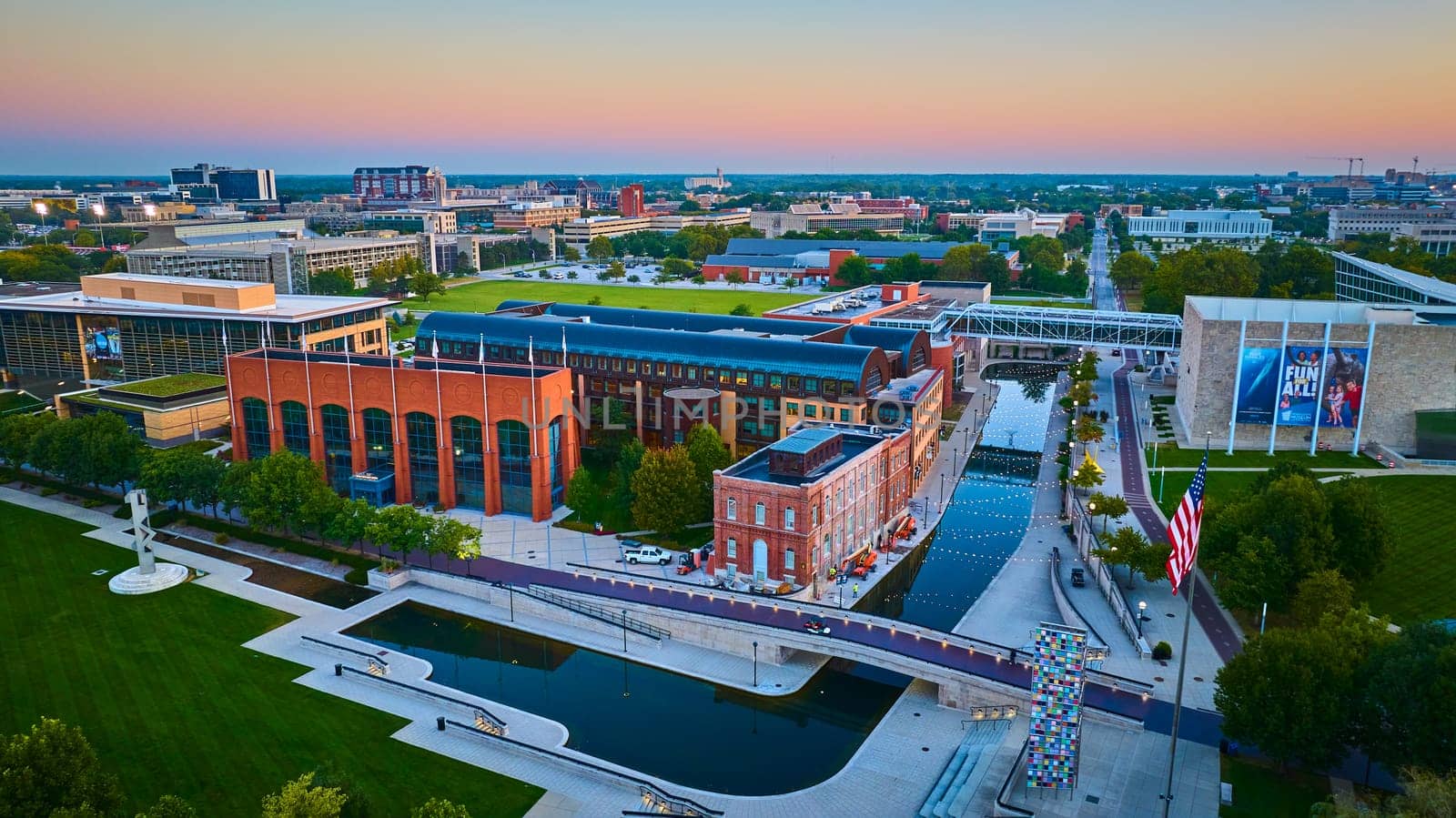 Twilight over Indianapolis: Aerial View of Modern and Historical Architecture by River, Captured via DJI Mavic 3 Drone in 2023