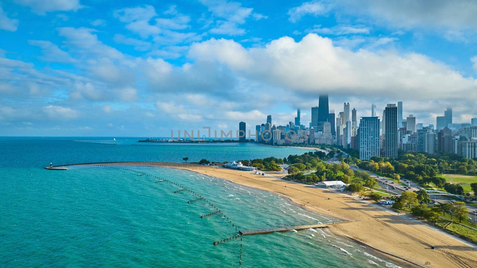 Image of Gorgeous Lake Michigan and Chicago beach and coast aerial on sunny summer day, tourism and travel