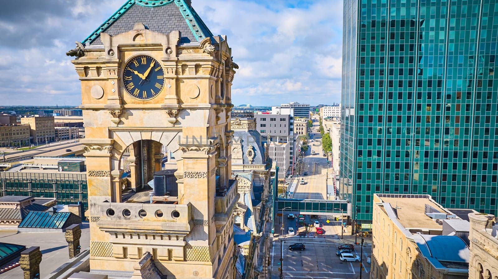 Aerial View of Historic Clock Tower Amidst Modern Skyscrapers in Milwaukee, 2023