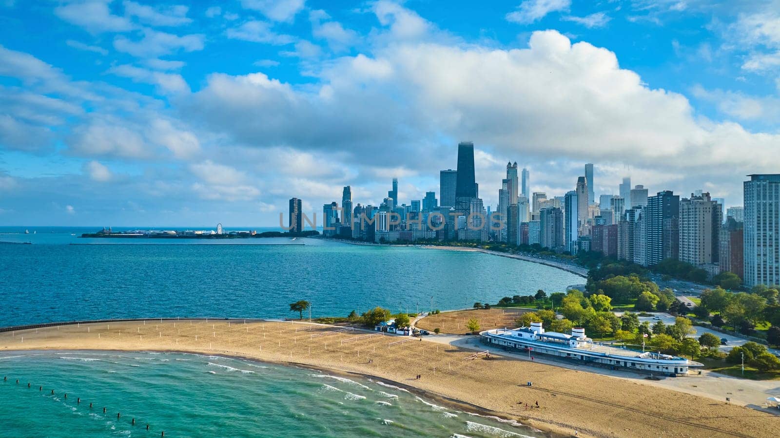 Image of Gorgeous sunny summer day aerial with blue sky over Chicago coast and Lake Michigan, tourism city