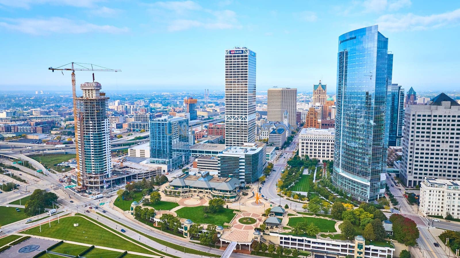 Bustling Milwaukee Cityscape with Skyscrapers and Public Park, Aerial Drone View, 2023