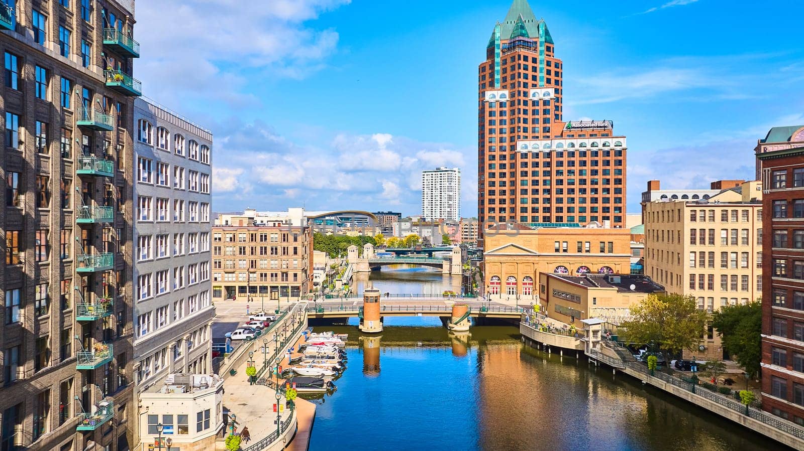 Vibrant aerial view of Milwaukee's historic and modern architecture by the river, captured by DJI Mavic 3 drone in 2023