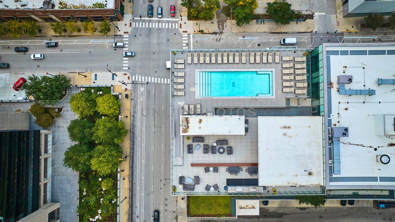 Rooftop pool aerial of Chicago on summer day in city with buildings from above, tourism by njproductions