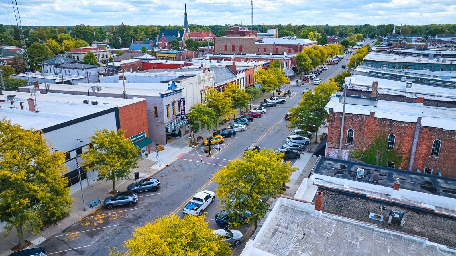 Aerial View of Historic Downtown Goshen, Indiana, Showcasing Small Town American Streetscape with Urban Trees and Cultural Heritage