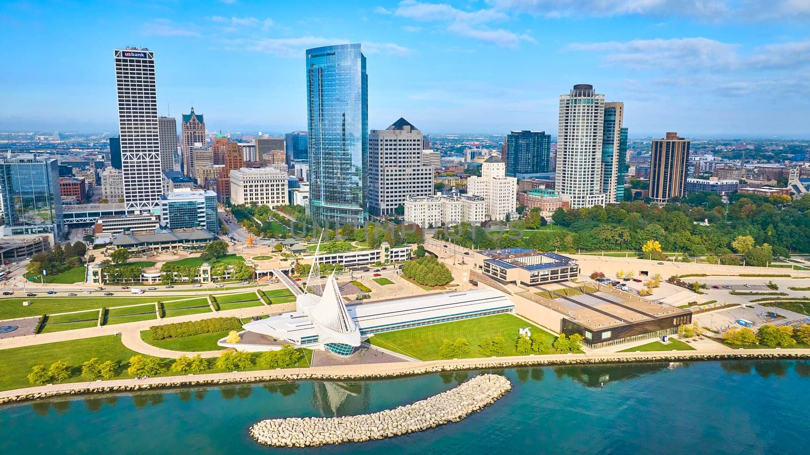 2023 Aerial View of Milwaukee, Showcasing Vibrant Cityscape with High-Rise Buildings, Quadracci Pavilion, and Scenic Lake Michigan