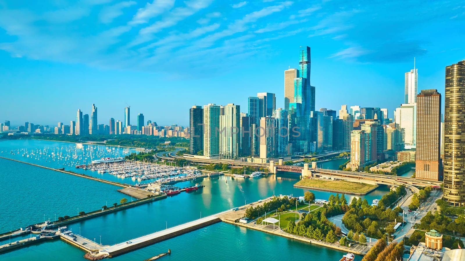 Image of Lake Michigan coastline from Chicago, IL with Navy Pier and city skyscrapers in summer aerial