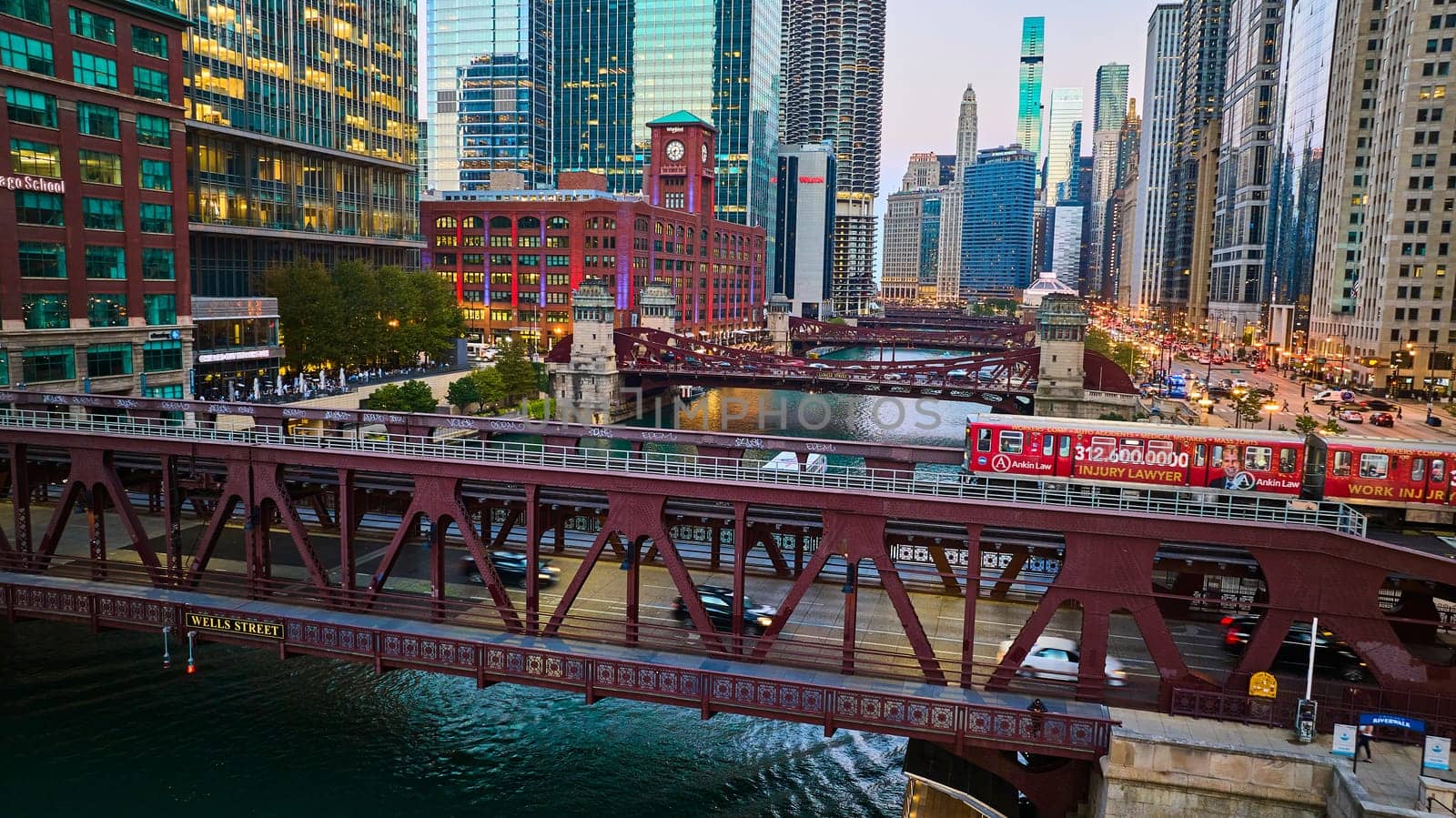 Chicago bridges over canal aerial with city lights and skyscraper buildings in downtown, tourism by njproductions