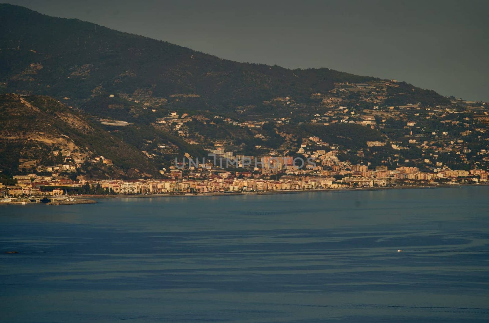 View of Menton Roquebrune Cap Martin from Monaco at sunset by vladimirdrozdin