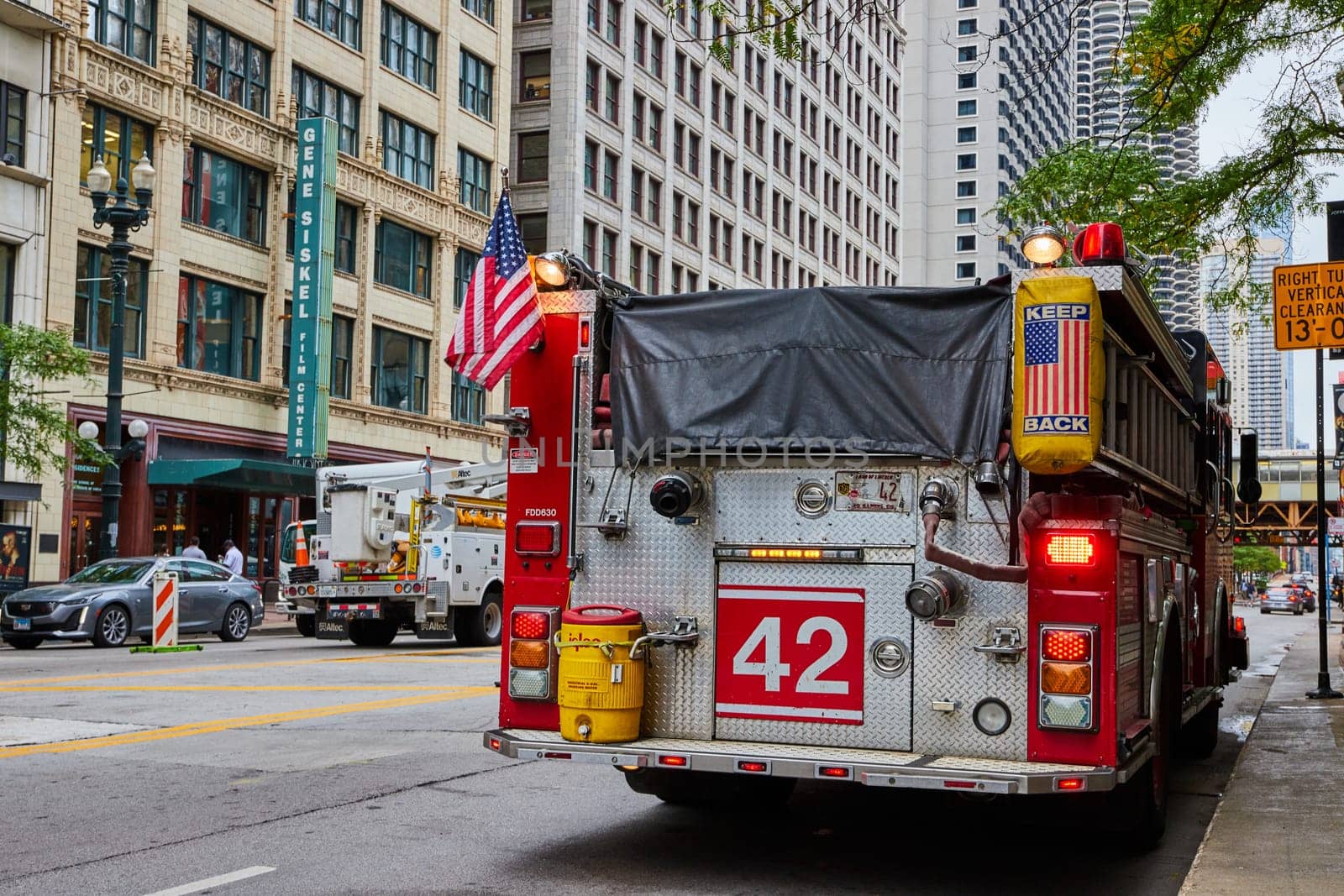 Image of Fire truck rear, fire safety and American flag on engine number 42, the meaning of life, Chicago, IL