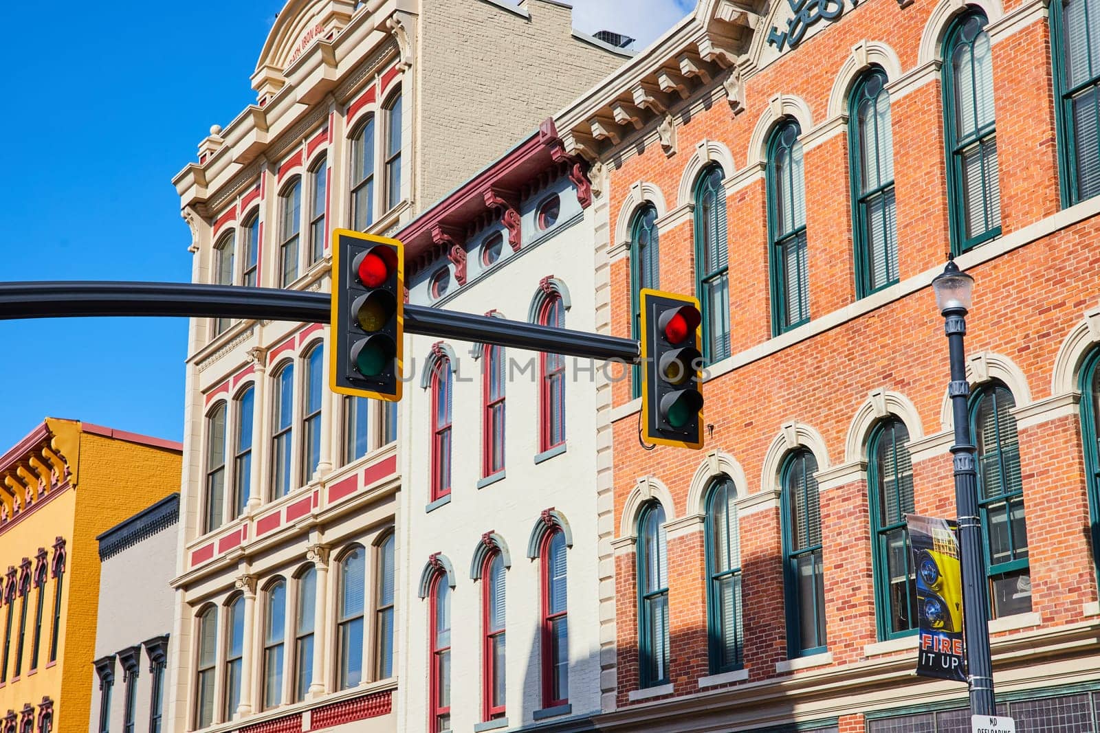 Historic Downtown Architecture with Traffic Lights and Blue Sky, Muncie by njproductions