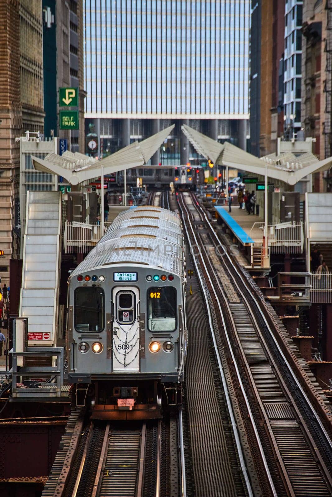 Modern Commuter Train in Urban Chicago, Elevated Track View by njproductions
