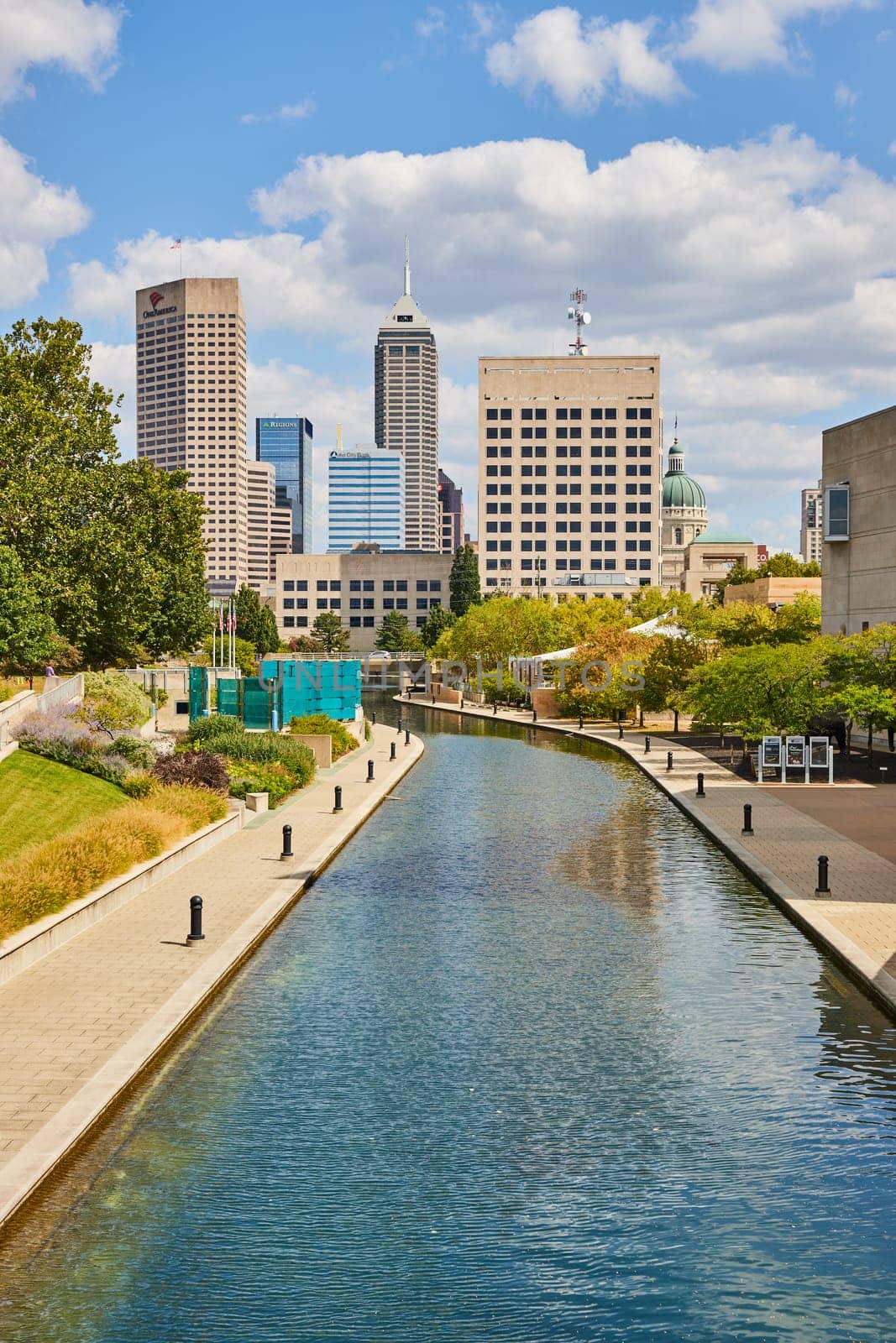 Sunny Day in Indianapolis - A Tranquil Canal Reflecting Dynamic Skyline with Modern and Historic Architecture, 2023