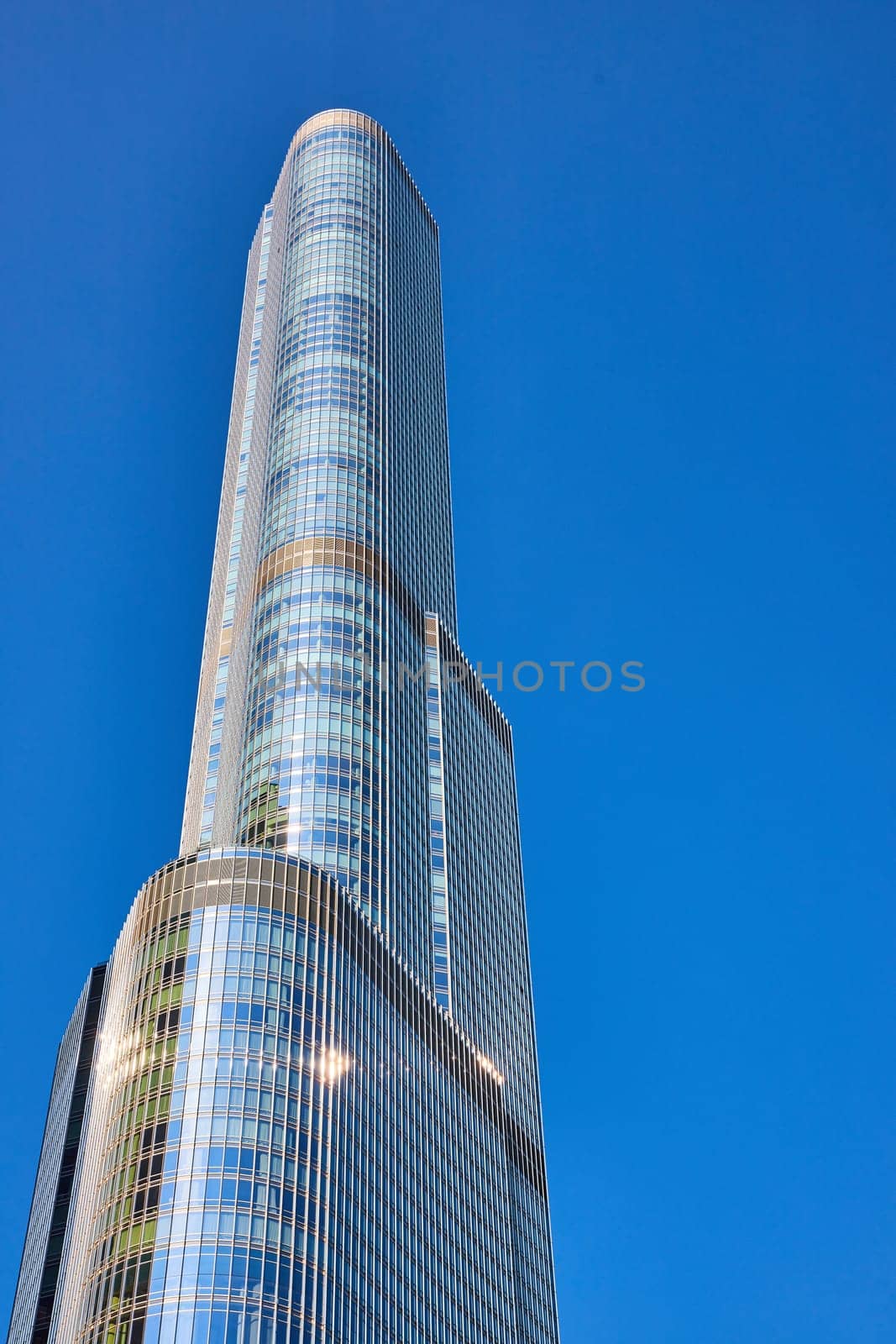 Trump Tower on bright summer day with clear blue sky above and around architecture, Chicago Illinois by njproductions