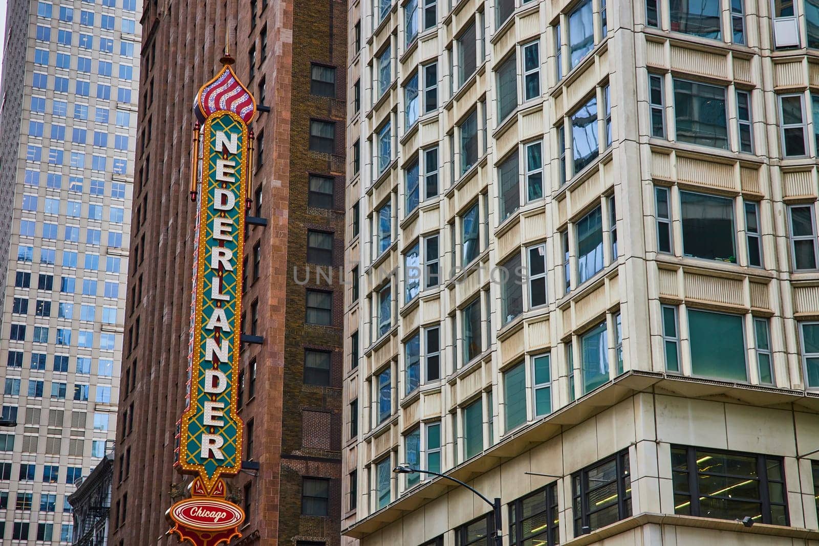 Nederlander sign on side of skyscraper building on gloomy day, Chicago Illinois, USA by njproductions