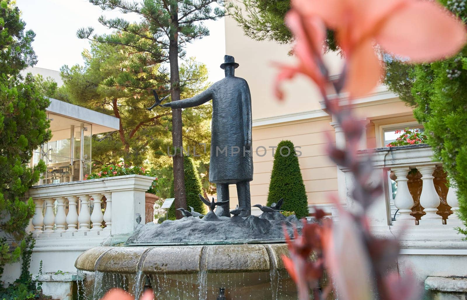 Monaco, Monaco Ville, 28 September 2022 - Bronze sculpture Bird Fountain by FOLON Jean Michel at sunset. High quality photo