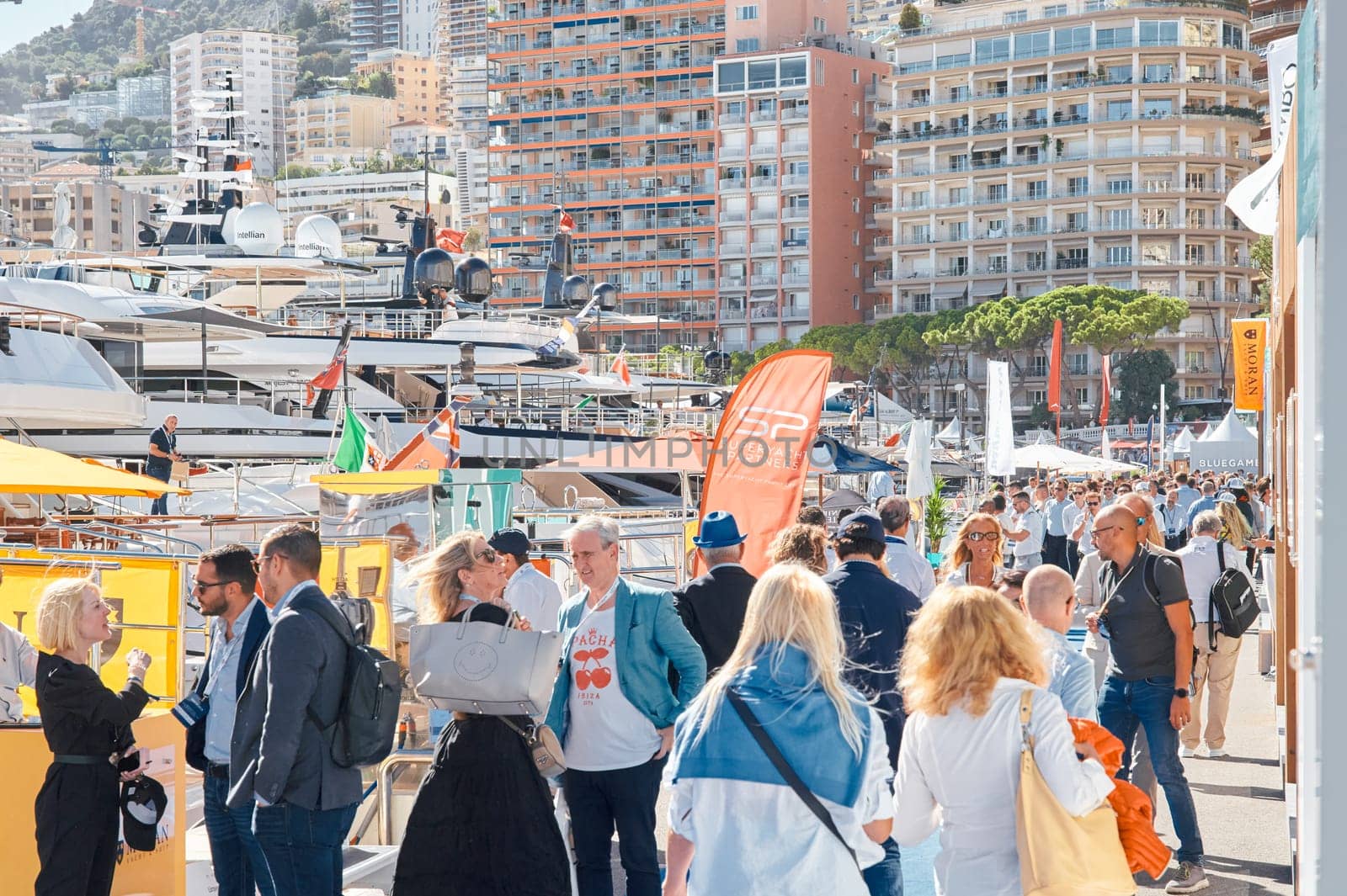 Monaco, Monte Carlo, 28 September 2022 - a lot of people, clients and yacht brokers look at the mega yachts presented, discuss the novelties of the boating industry at the famous motorboat exhibition by vladimirdrozdin