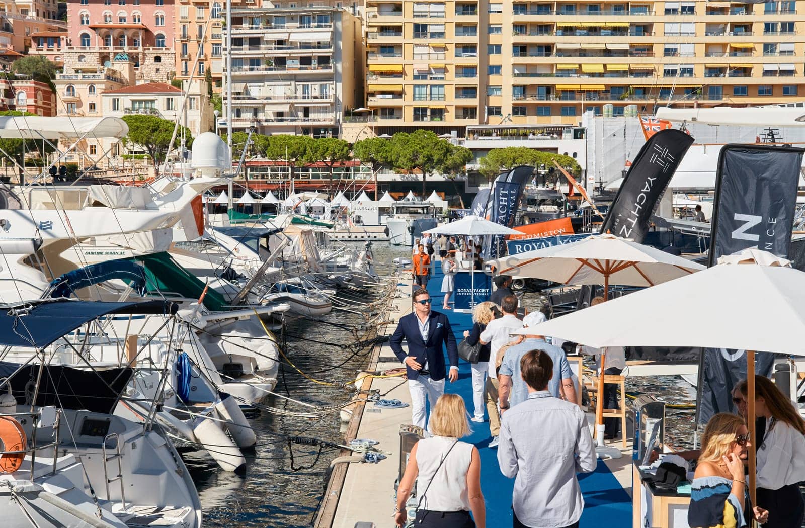 Monaco, Monte Carlo, 28 September 2022 - Top view of the famous yacht show, exhibition of luxury mega yachts, the most expensive boats for the richest people around the world, yacht brokers. High quality photo