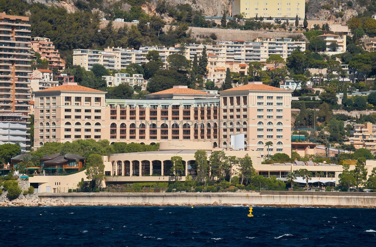 Monaco, Monte Carlo, 28 September 2022: Famous hotel Monte-Carlo Bay, pier of beach Larvotto, Meridian beach. High quality photo