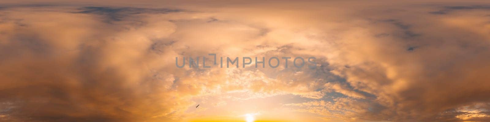 Bright sunset sky panorama with Cirrus clouds. Seamless hdr spherical equirectangular 360 panorama. Sky dome or zenith for 3D visualization, game and sky replacement for aerial drone 360 panoramas.