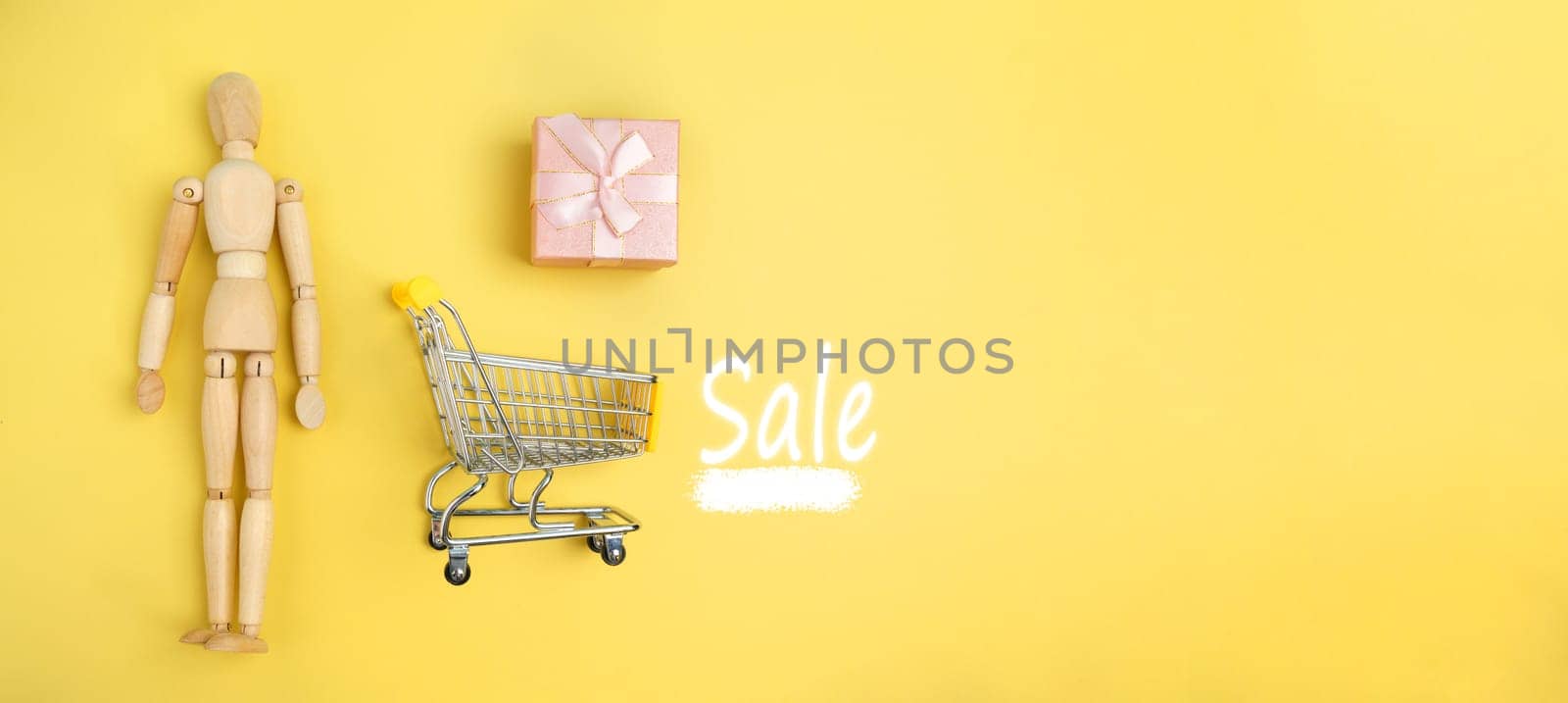Small Shopping Cart and a Gift Box. Sale, shopping. Banner, copy space