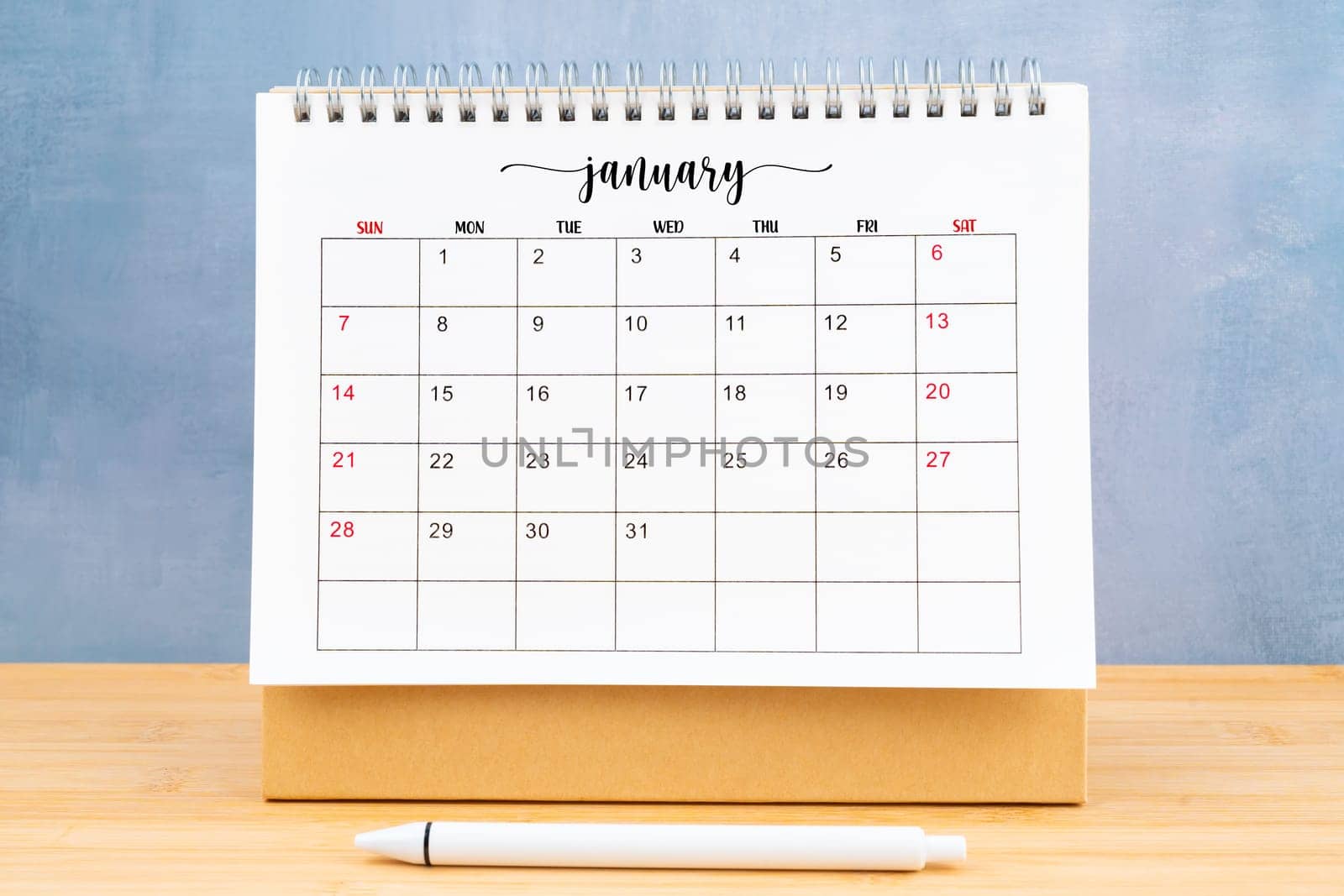January 2024, Monthly desk calendar for 2024 year with pen. by Gamjai