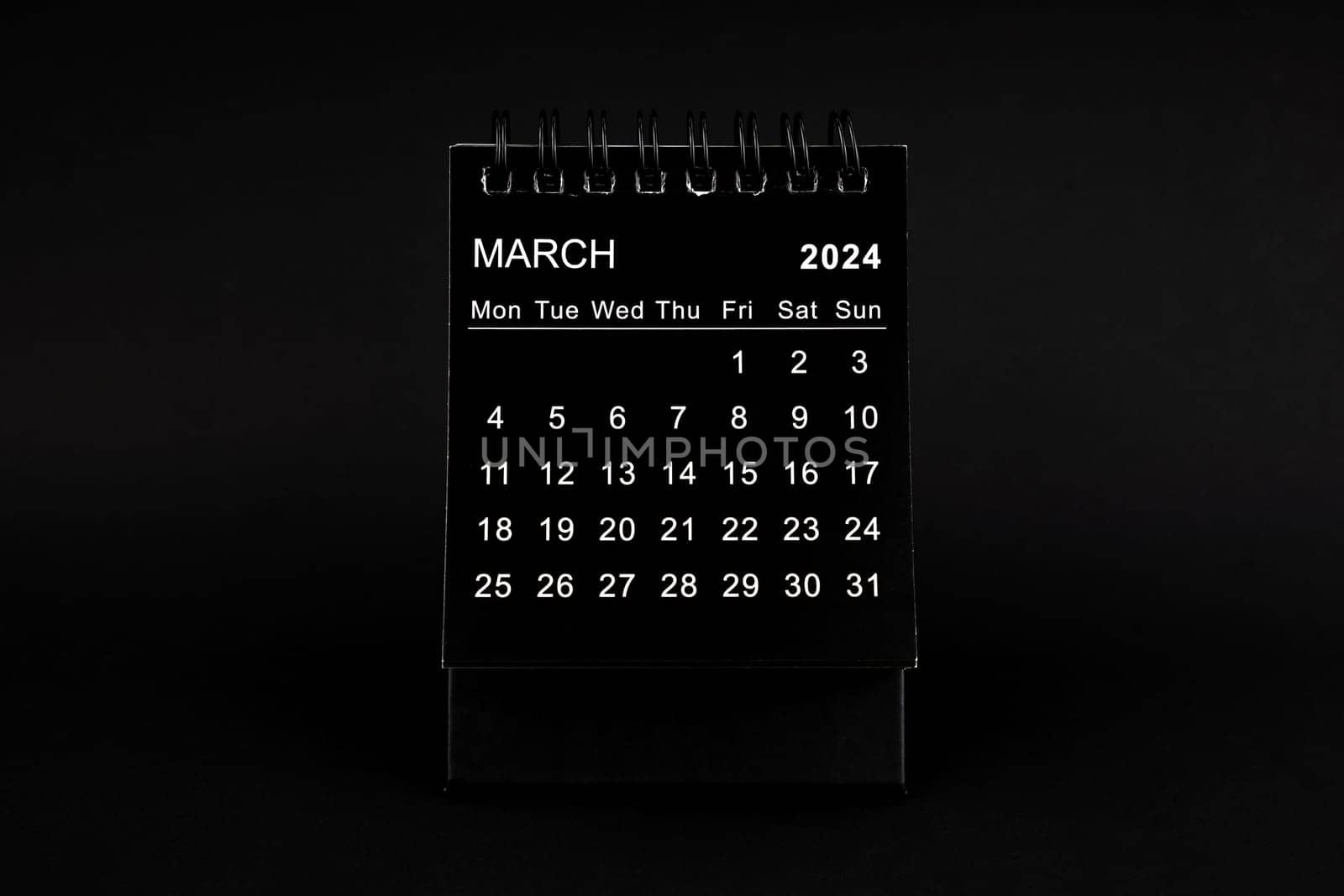 Black Calendar for March 2024. Desktop calendar on a black color background.