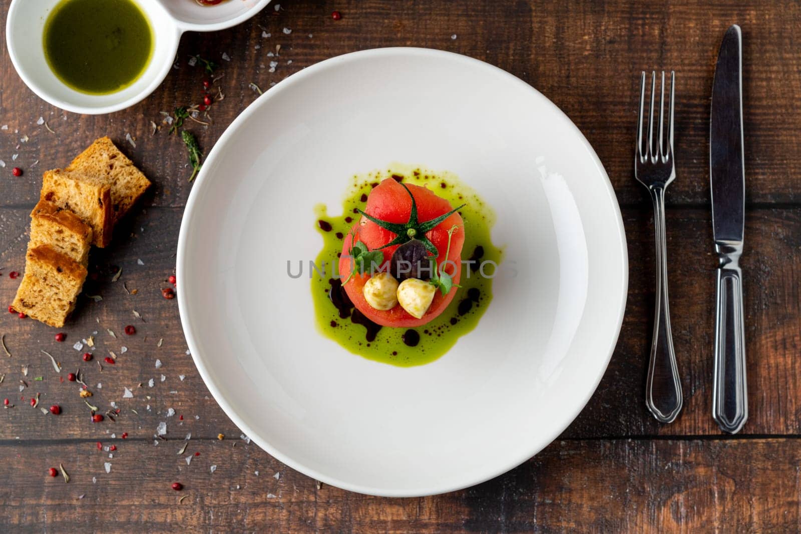 Tomato Caprese salad with mozzarella and micro sprouts by Sonat