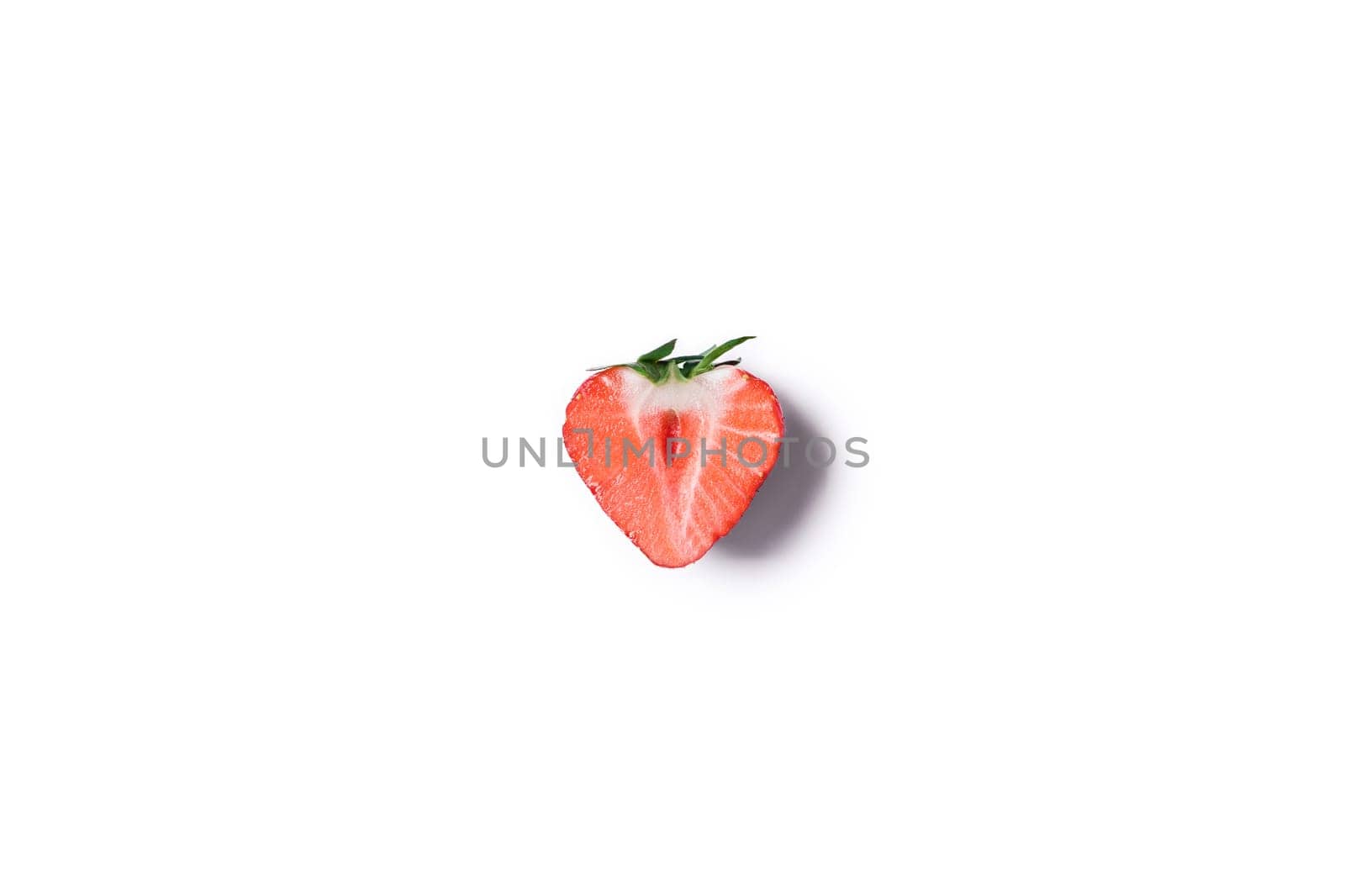 Sweet summer strawberry on an isolated white background.