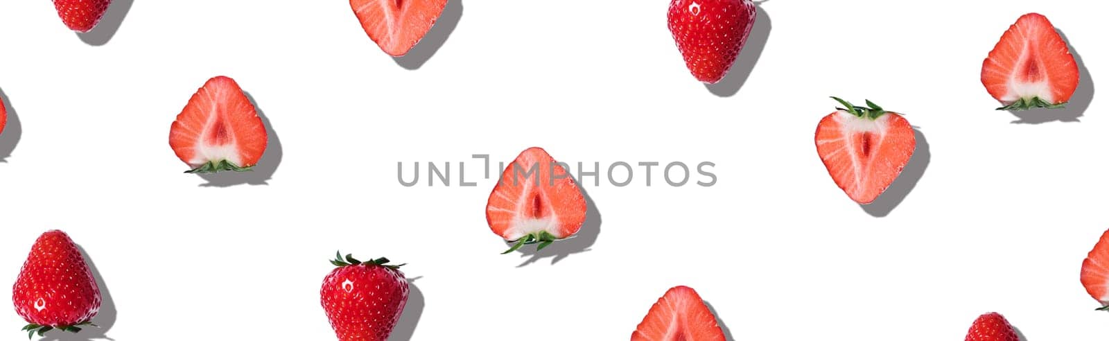 Sweet summer strawberries on an isolated white background.