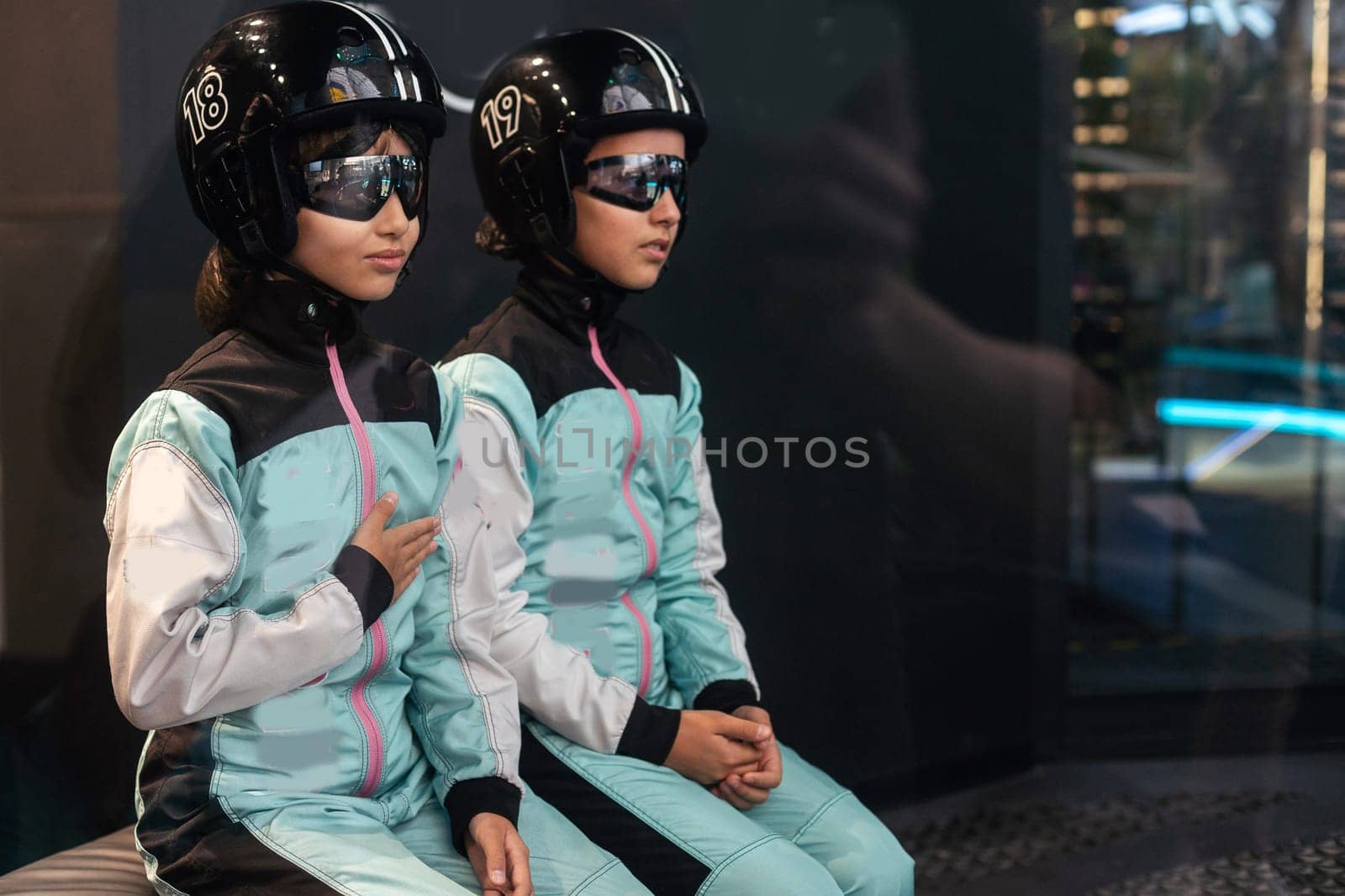 children in astronaut costumes, girls. High quality photo