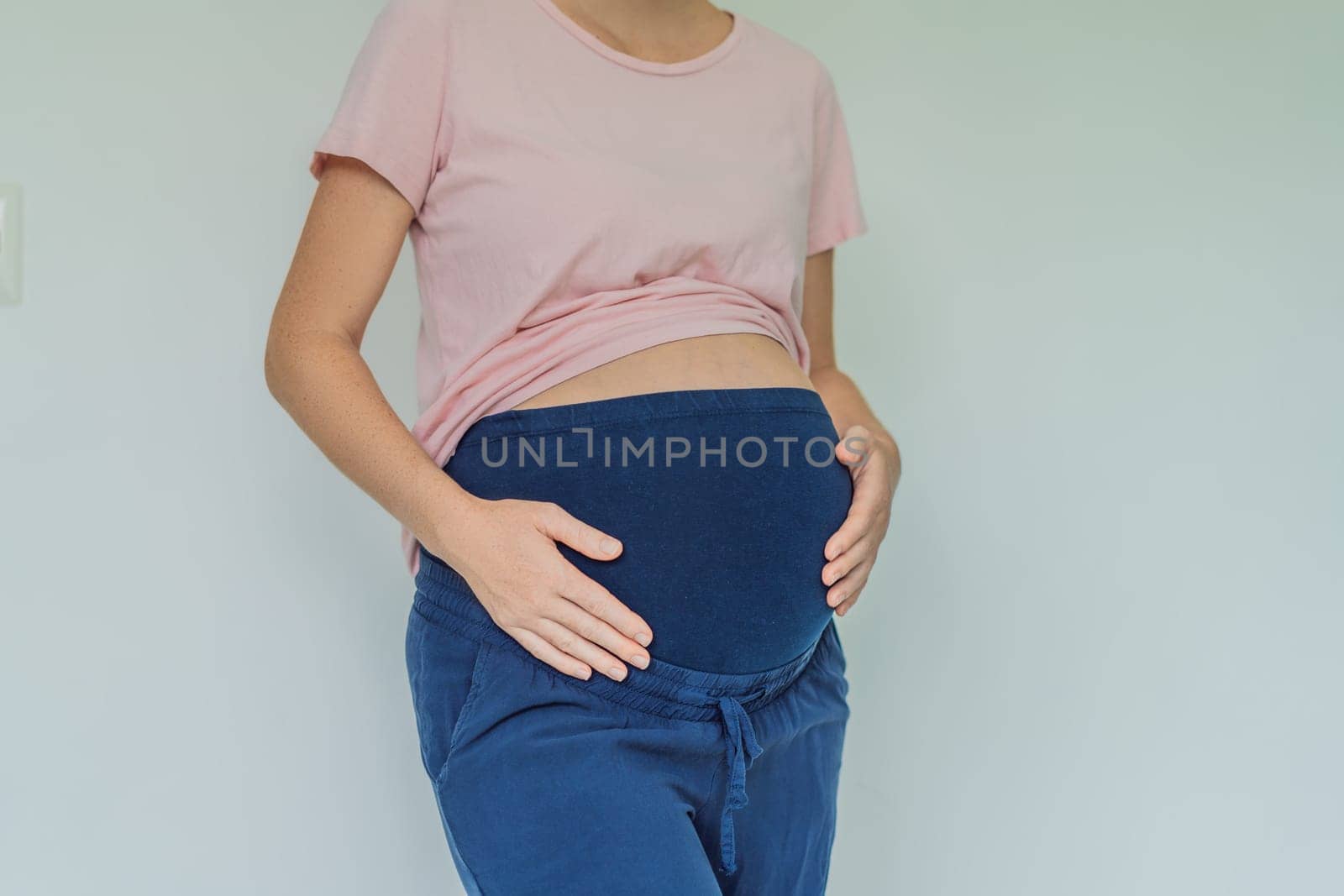 Chic maternity pants, comfy belly insert for expecting moms - stylish, practical, and perfect for the journey into motherhood.