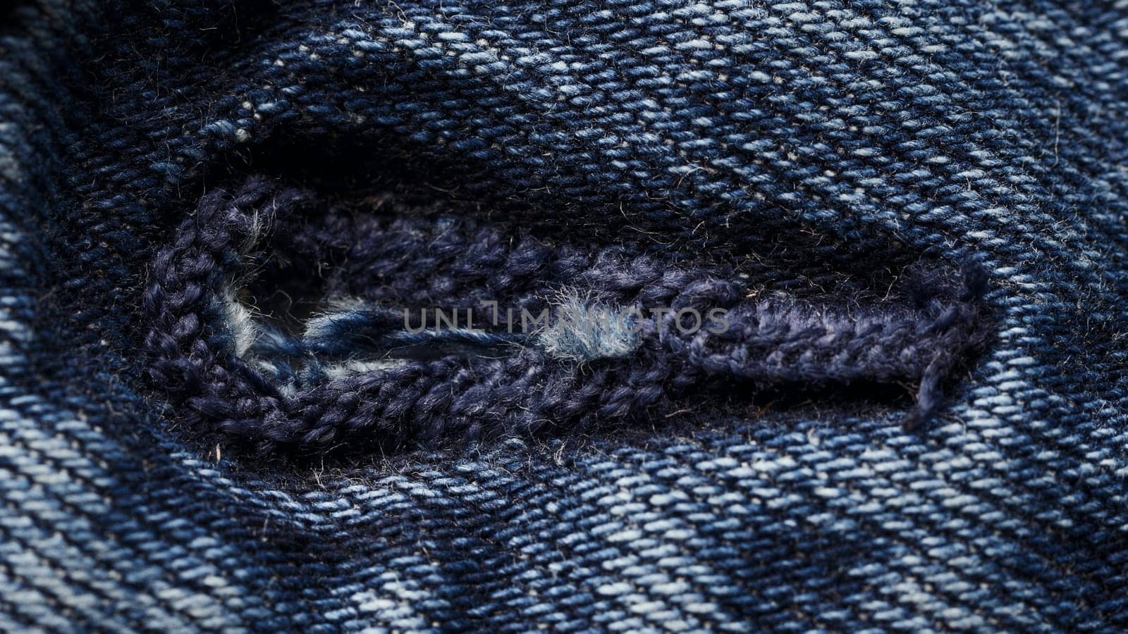 Button loop on jeans. Close up of Button Loop. Denim fastener button and loop close-up.