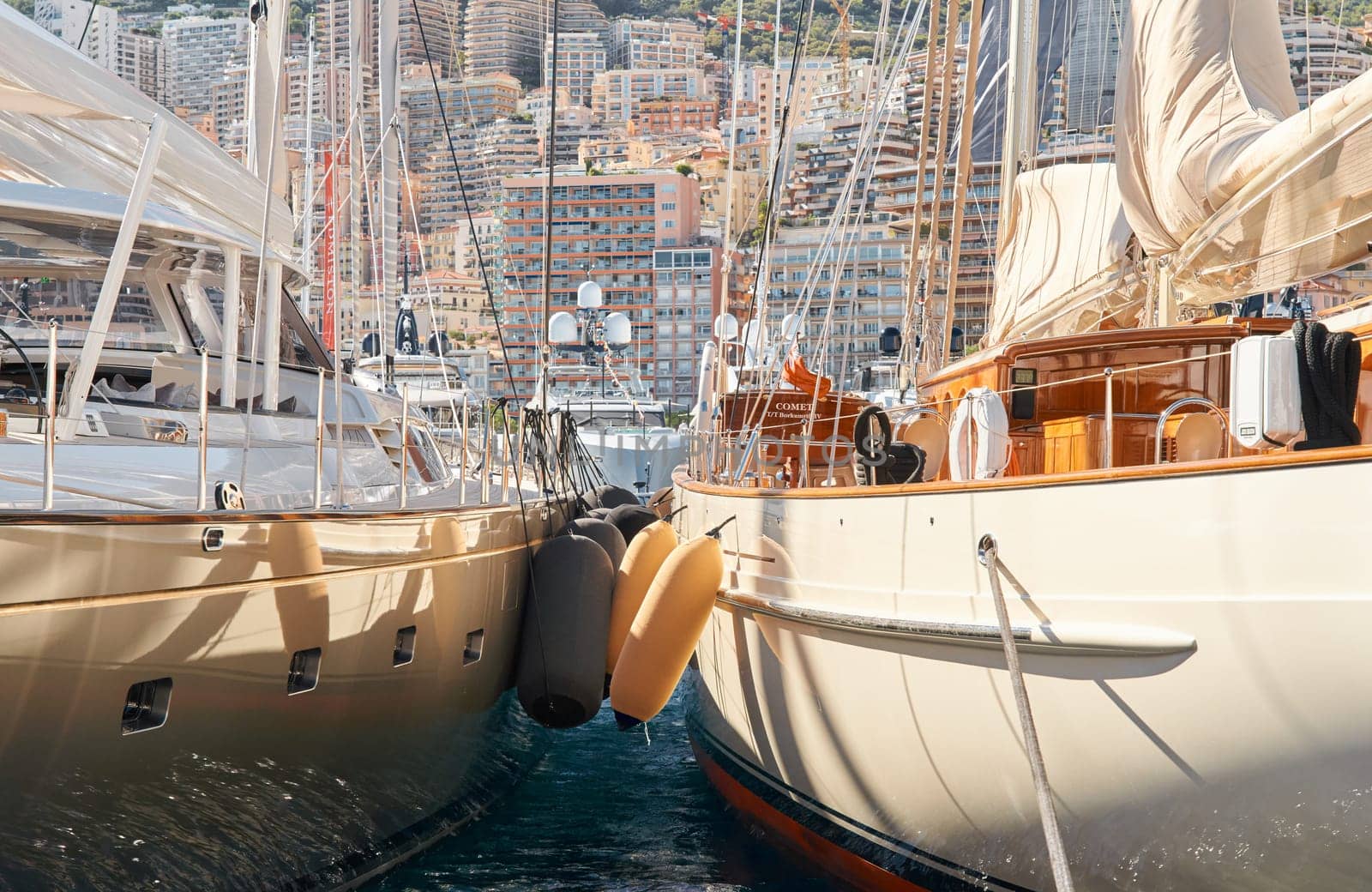 Monaco, Monte Carlo, 28 September 2022 - view on the famous yacht show through sailing yacht, exhibition of luxury mega yachts, yacht brokers. High quality photo