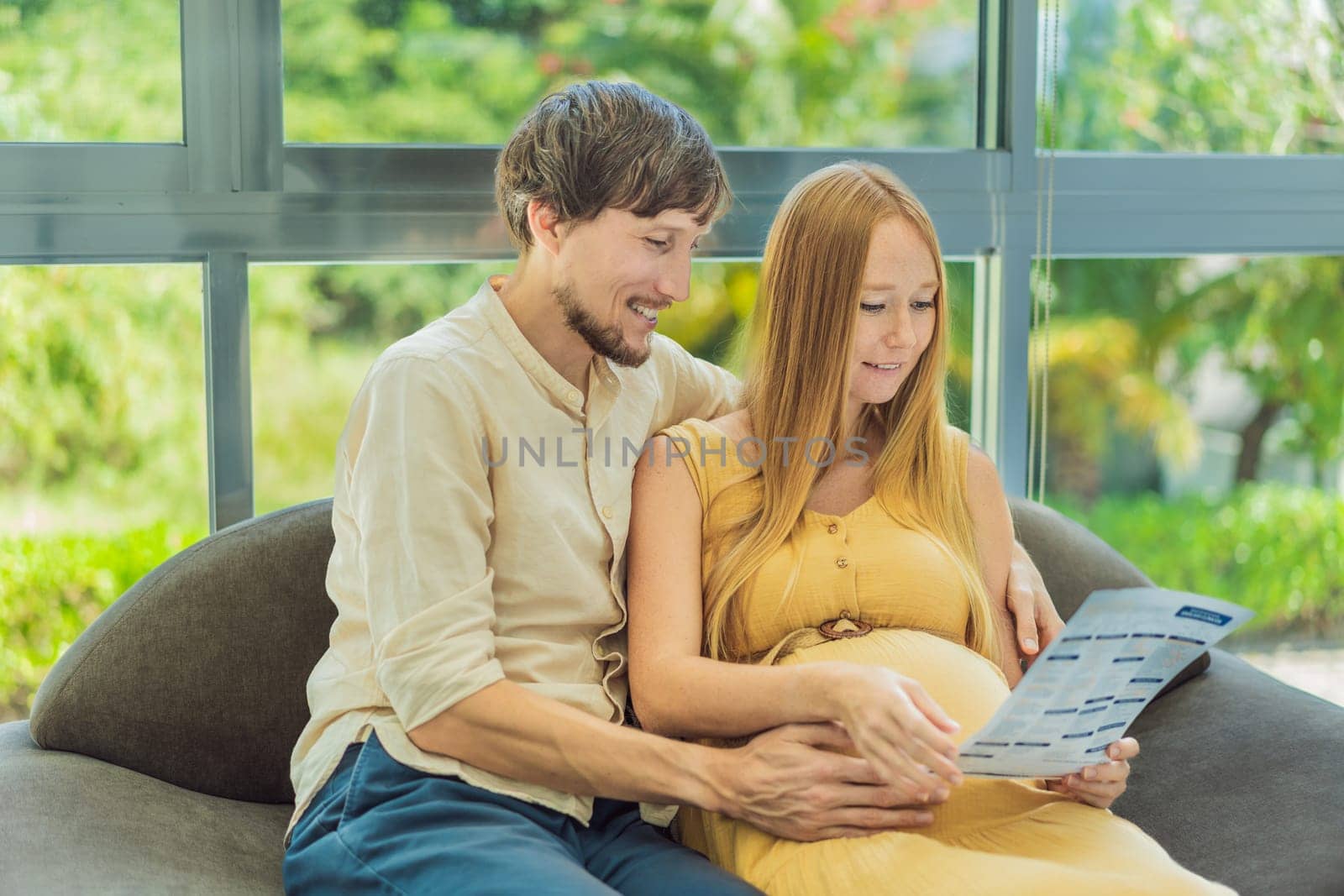 Expectant couple reviews blood test results, navigating pregnancy together with concern and anticipation.