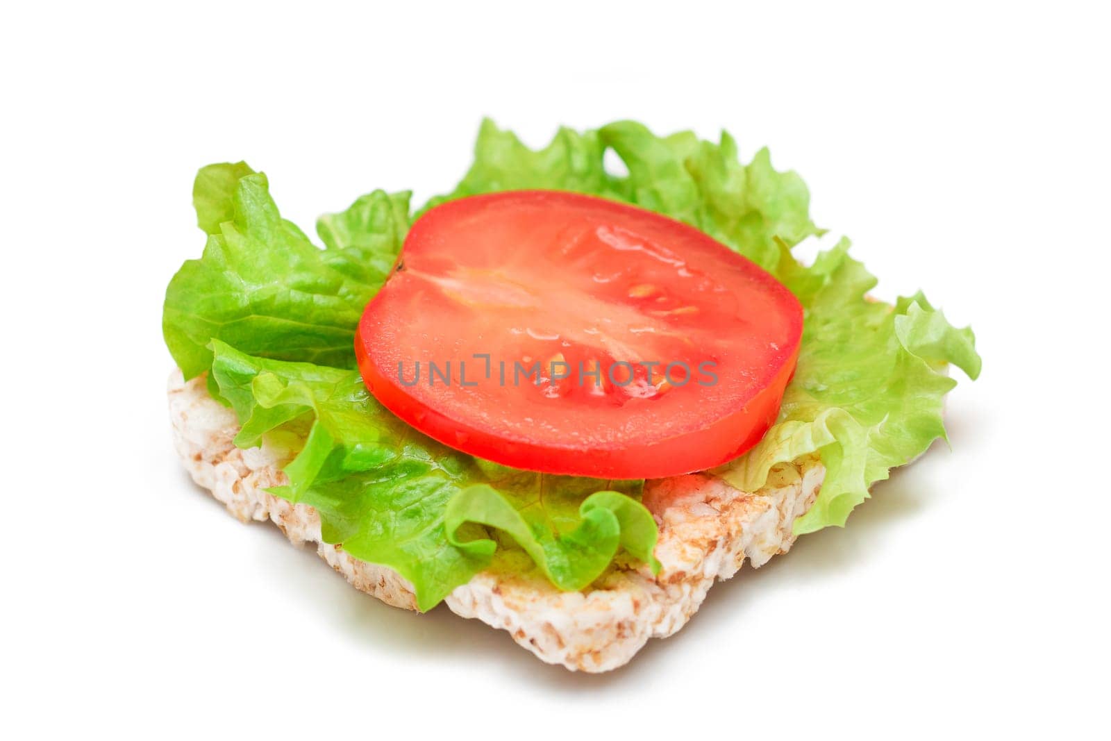 Rice Cake Sandwich with Tomato and Lettuce - Isolated on White. Easy Breakfast. Diet Food. Quick and Healthy Sandwiches. Crispbread with Tasty Filling. Healthy Dietary Snack - Isolation